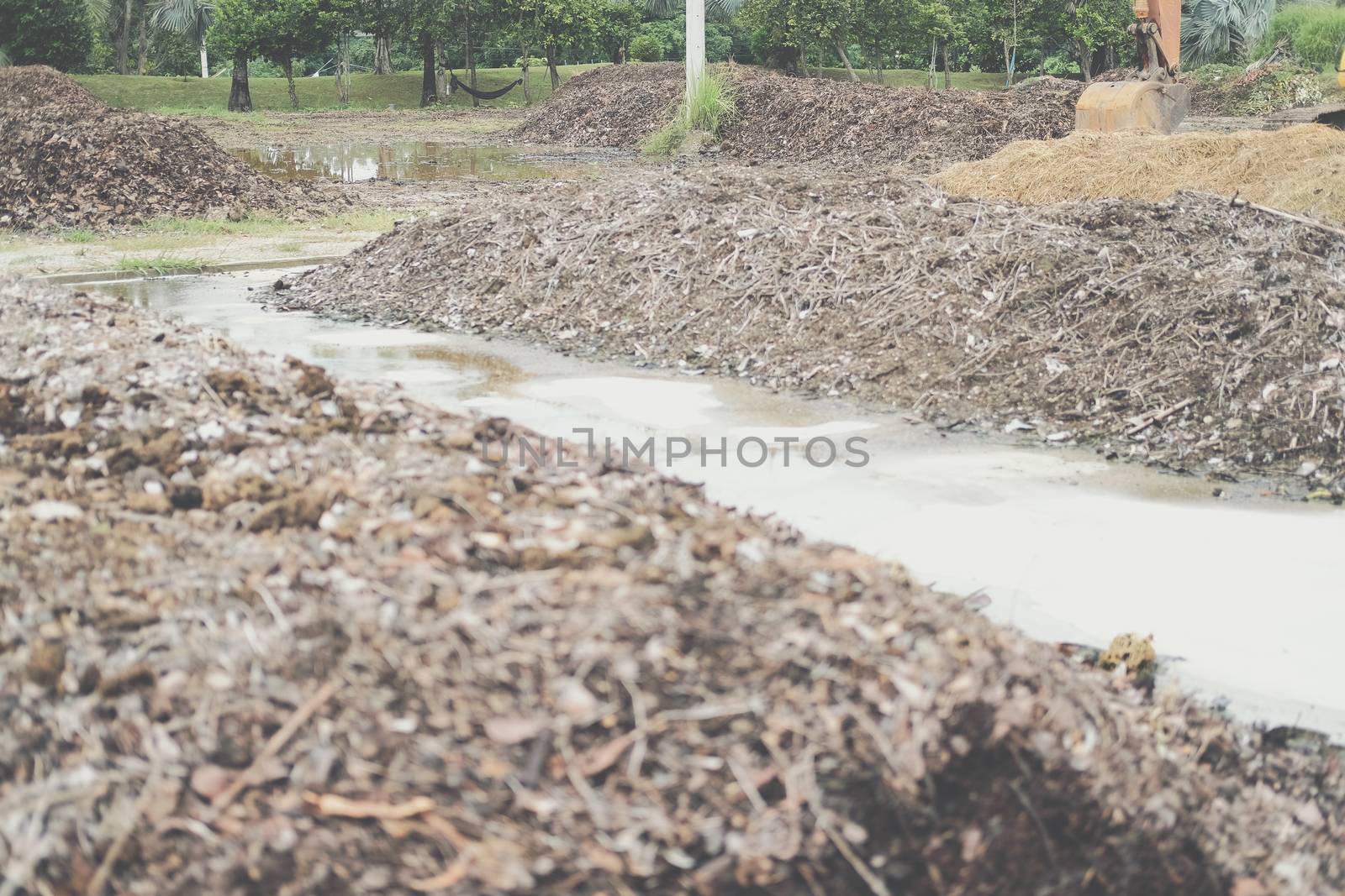 organic compost heap. fertilizer production for soil cultivation in agriculture industry