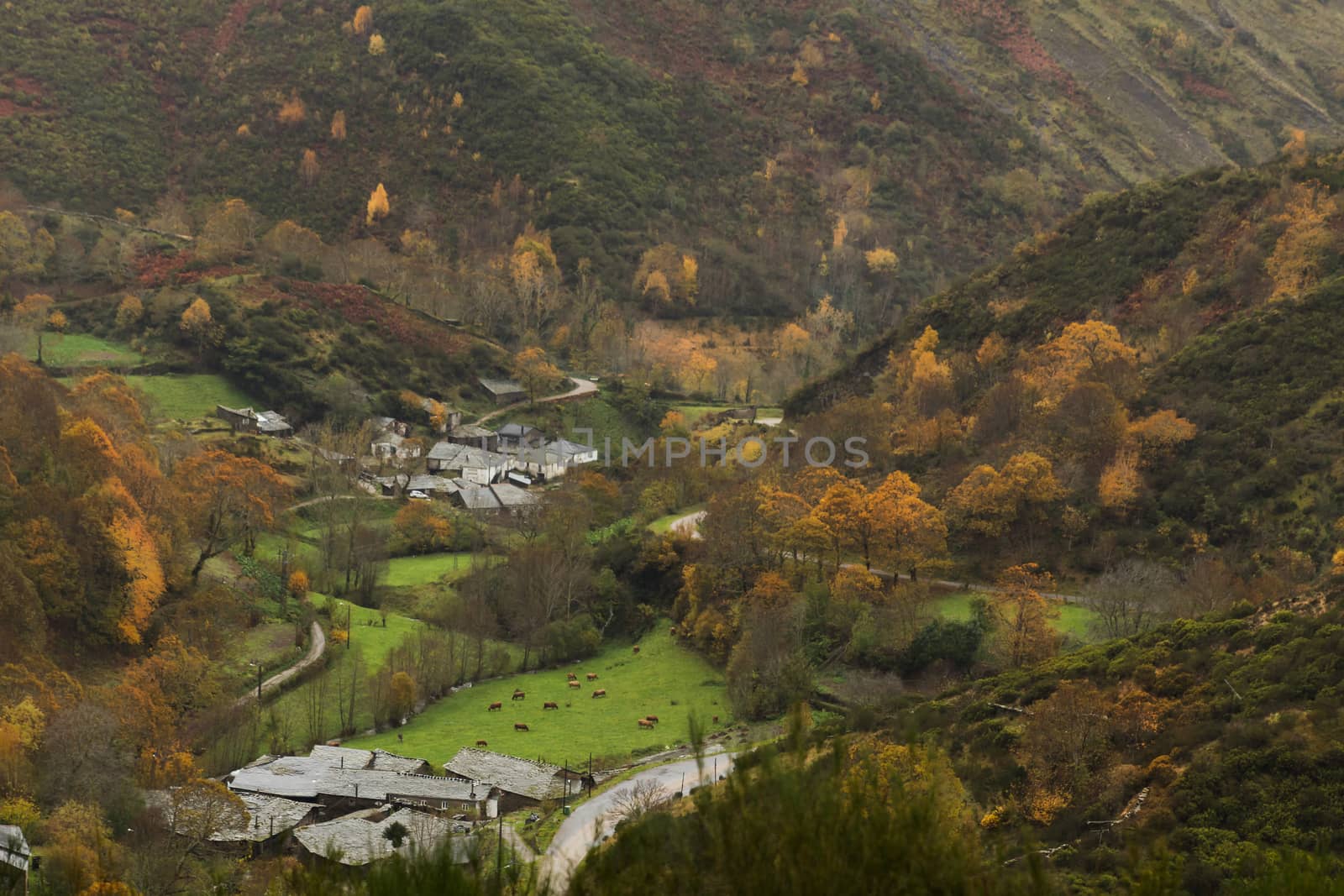 Small villages in the middle of a valley in autumn