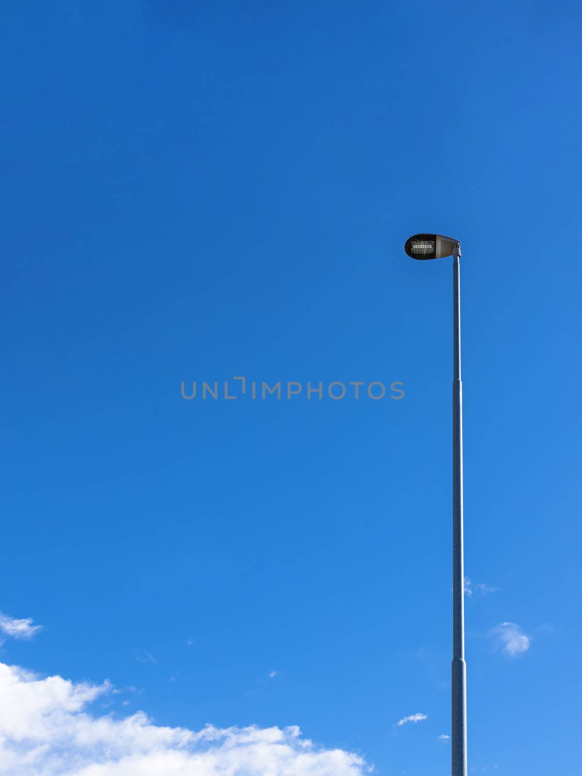 Modern led street lamp. LED street lamp on blue sky.