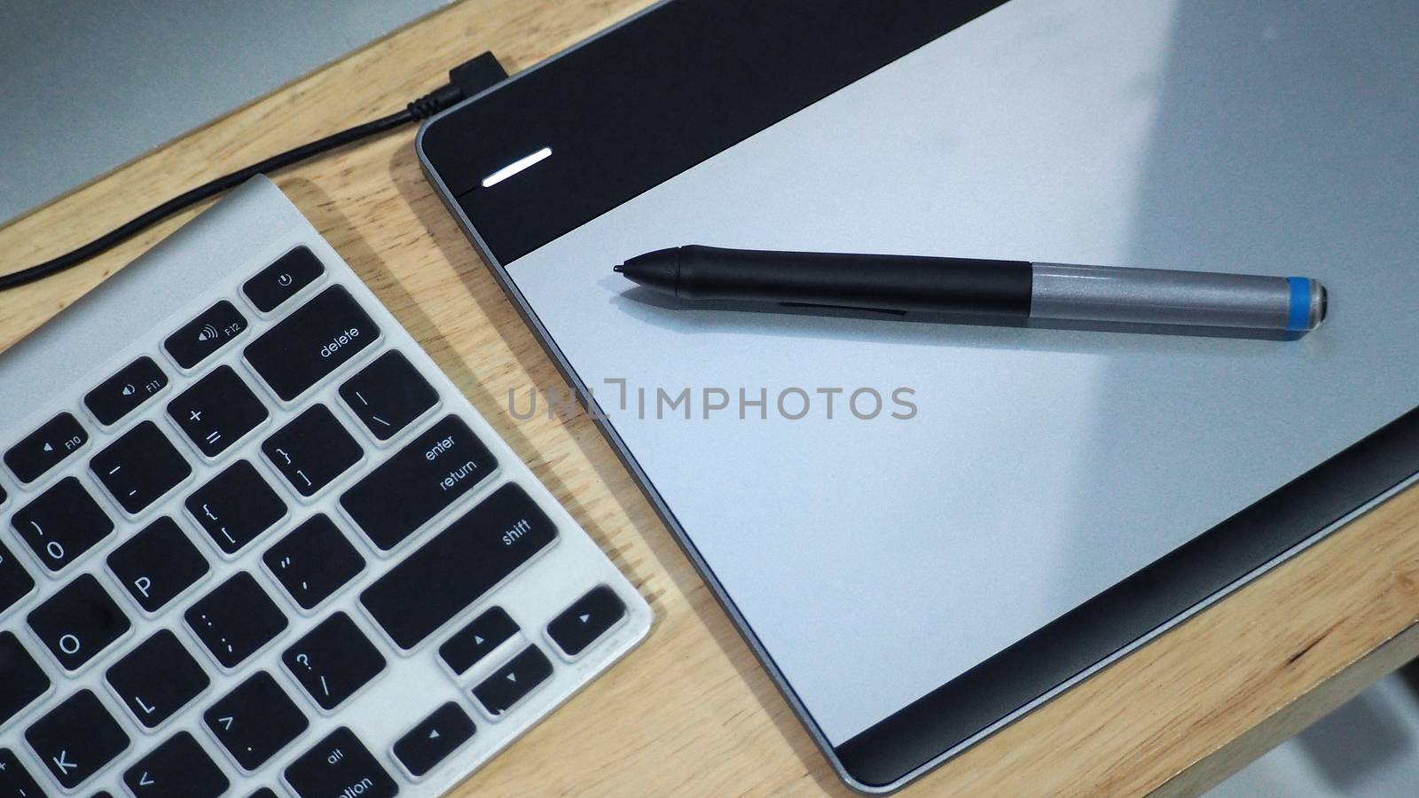 Wacom pen and drawing tablet and keyboard. by gnepphoto