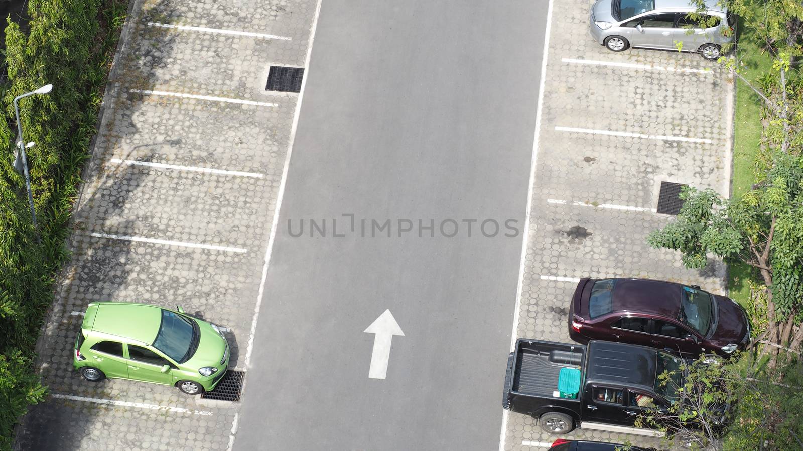 Car parking space and concrete road outdoor. by gnepphoto