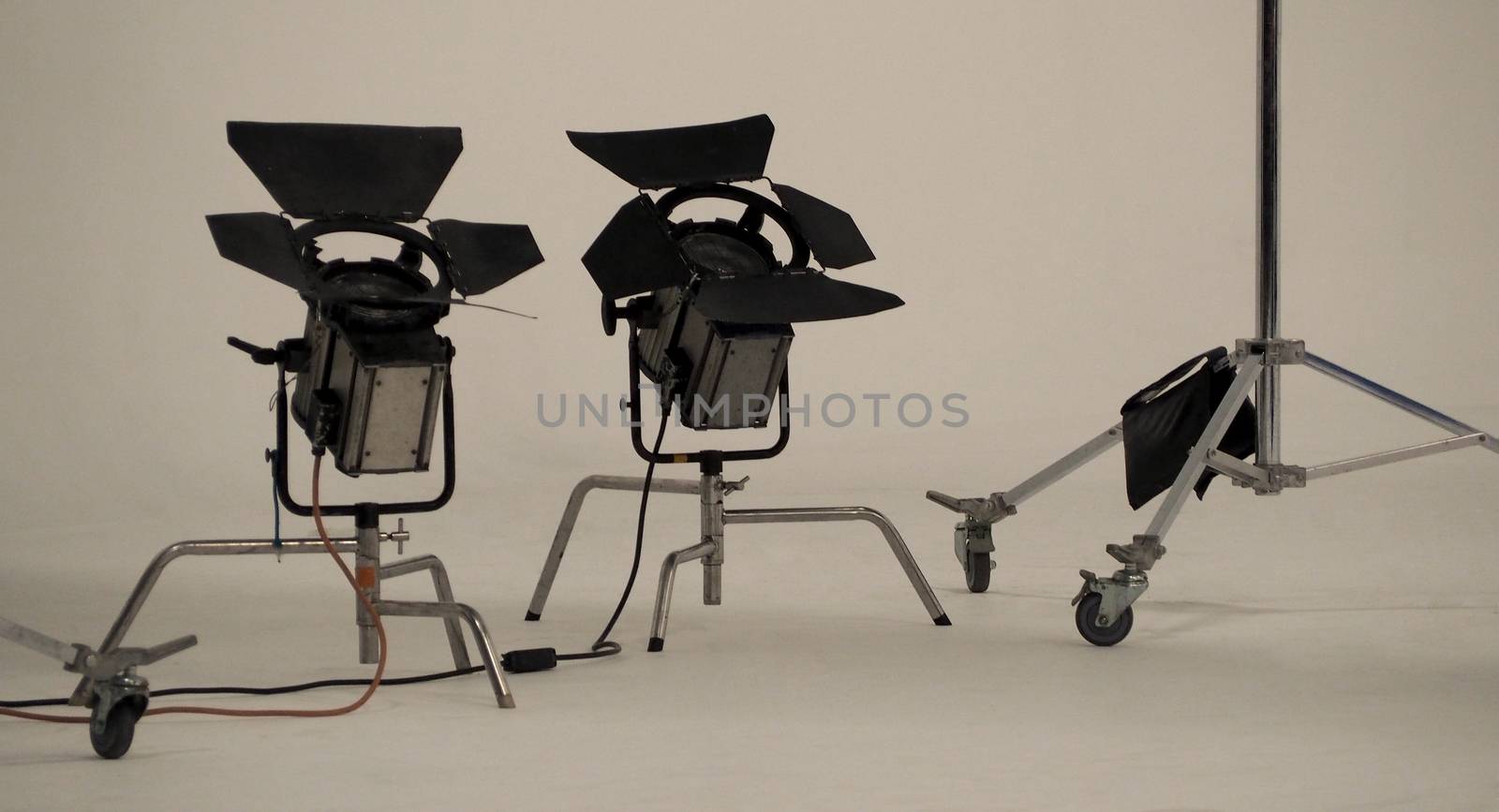 Camera spotlight tool equipment for photo and video works in big studio.