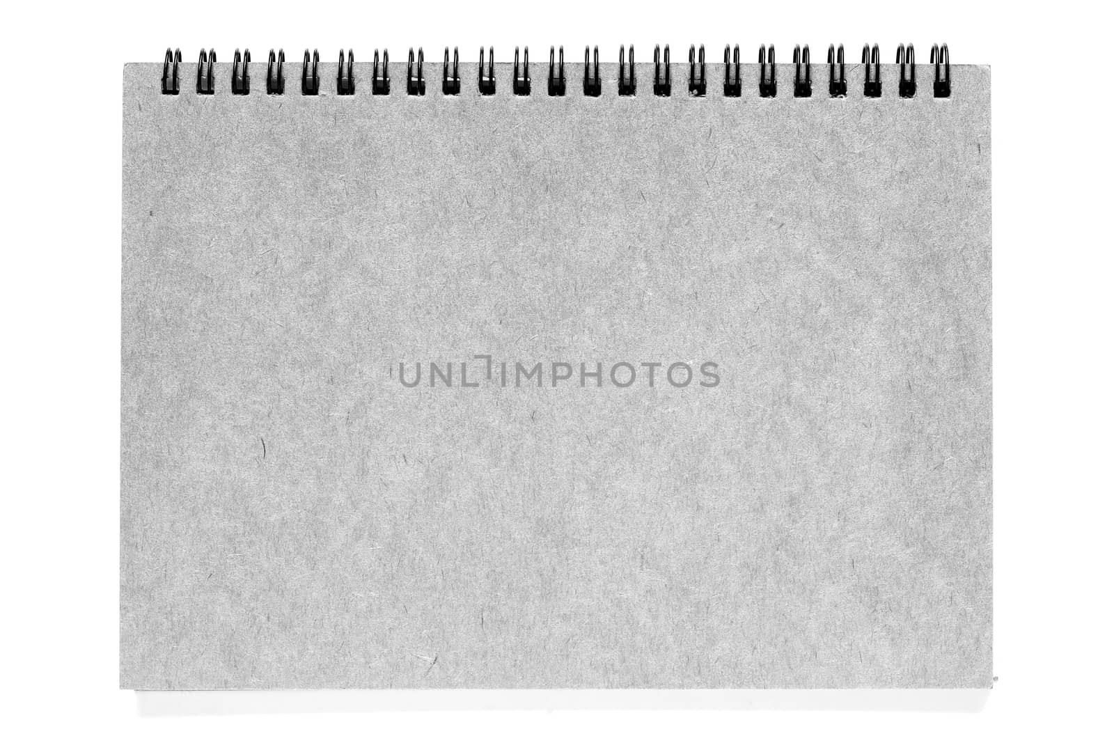 Grey spiral notebook on isolated white background