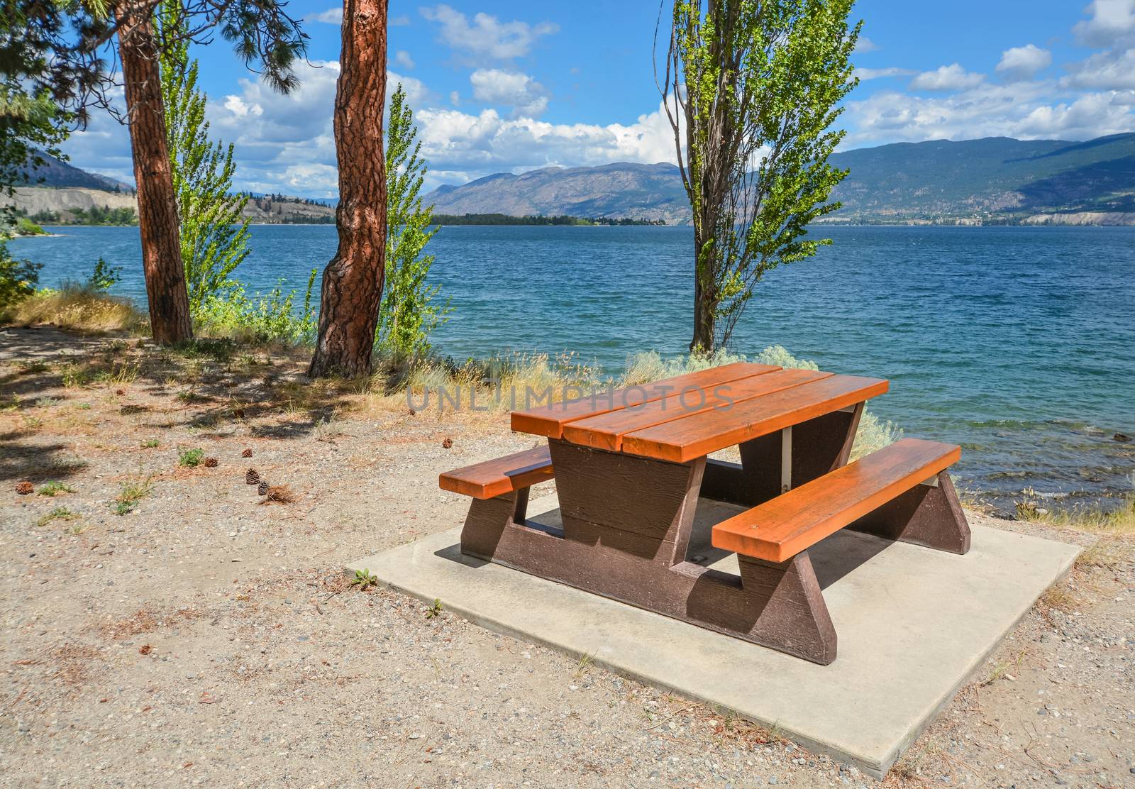 Picnic table on a shore of Okanagan lake