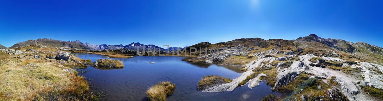 panorama scenery of the swiss alps. Lake at the top of grimsel p by PeterHofstetter