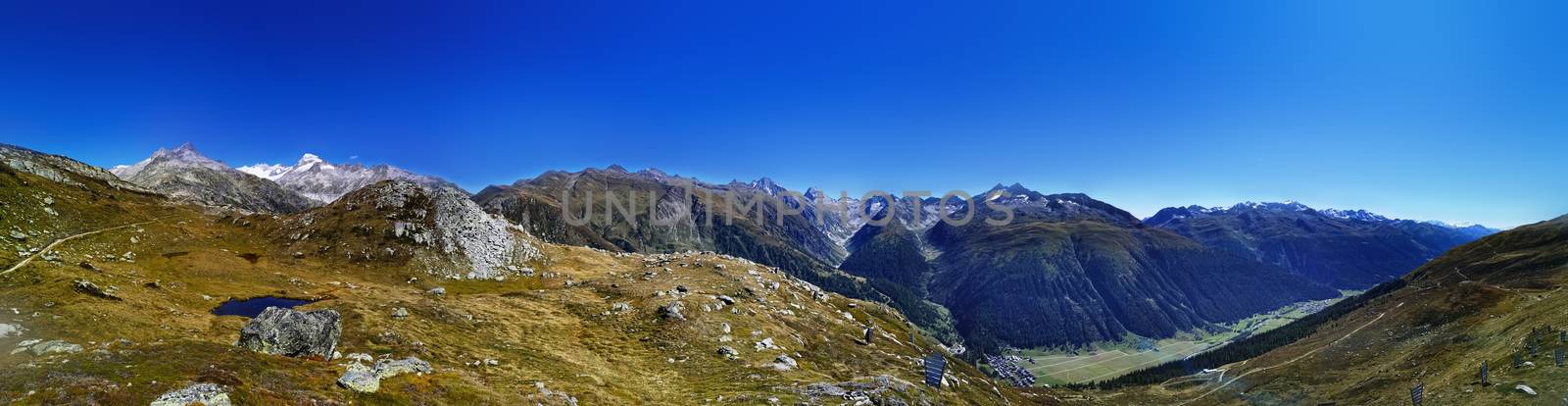 panorama scenery of the swiss alps. Lake at the top of grimsel p by PeterHofstetter