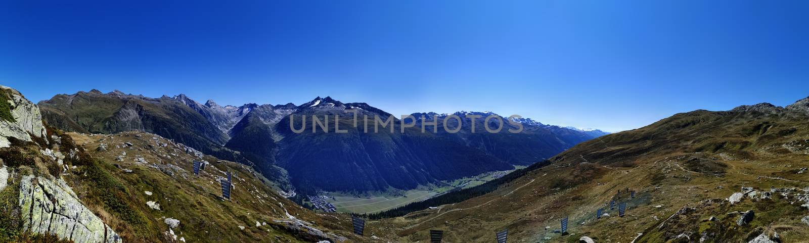 panorama scenery of the swiss alps. Lake at the top of grimsel p by PeterHofstetter