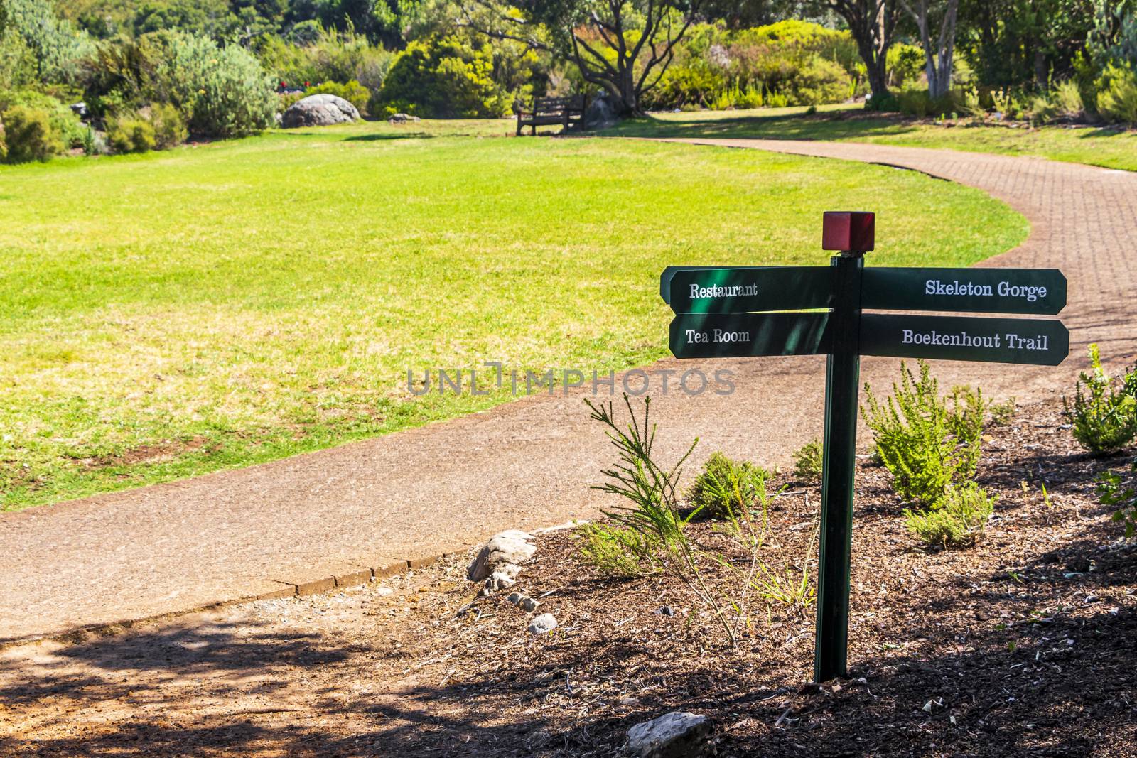 Signposted hiking trails green turquoise sign in Kirstenbosch, Cape Town, South Africa.