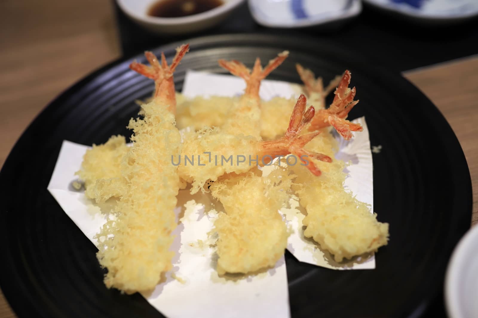 Shrimp tempura looks delicious on the plate. In a japanese restaurant. Selective focus. by joker3753