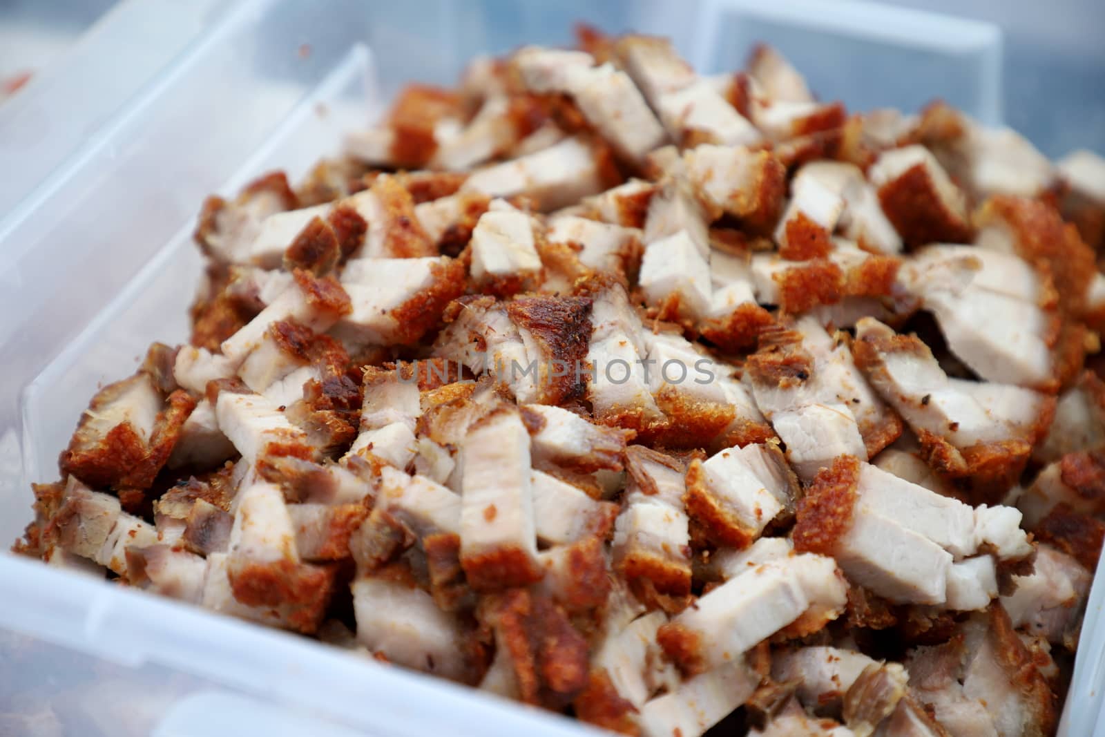 Crispy pork or pork belly Crispy refers to products that are obtained by washing the pork belly scraped and then thoroughly washed. May be cooked, cut into pieces to the desired size. Selective focus. by joker3753