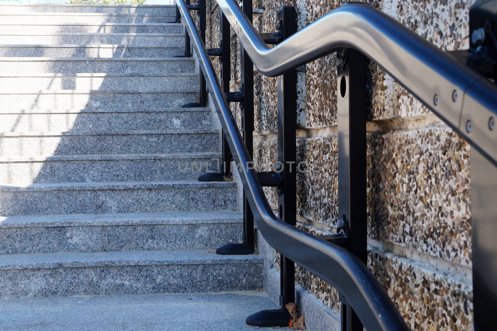 Lift on the stairs for people with disabilities in the underpass.