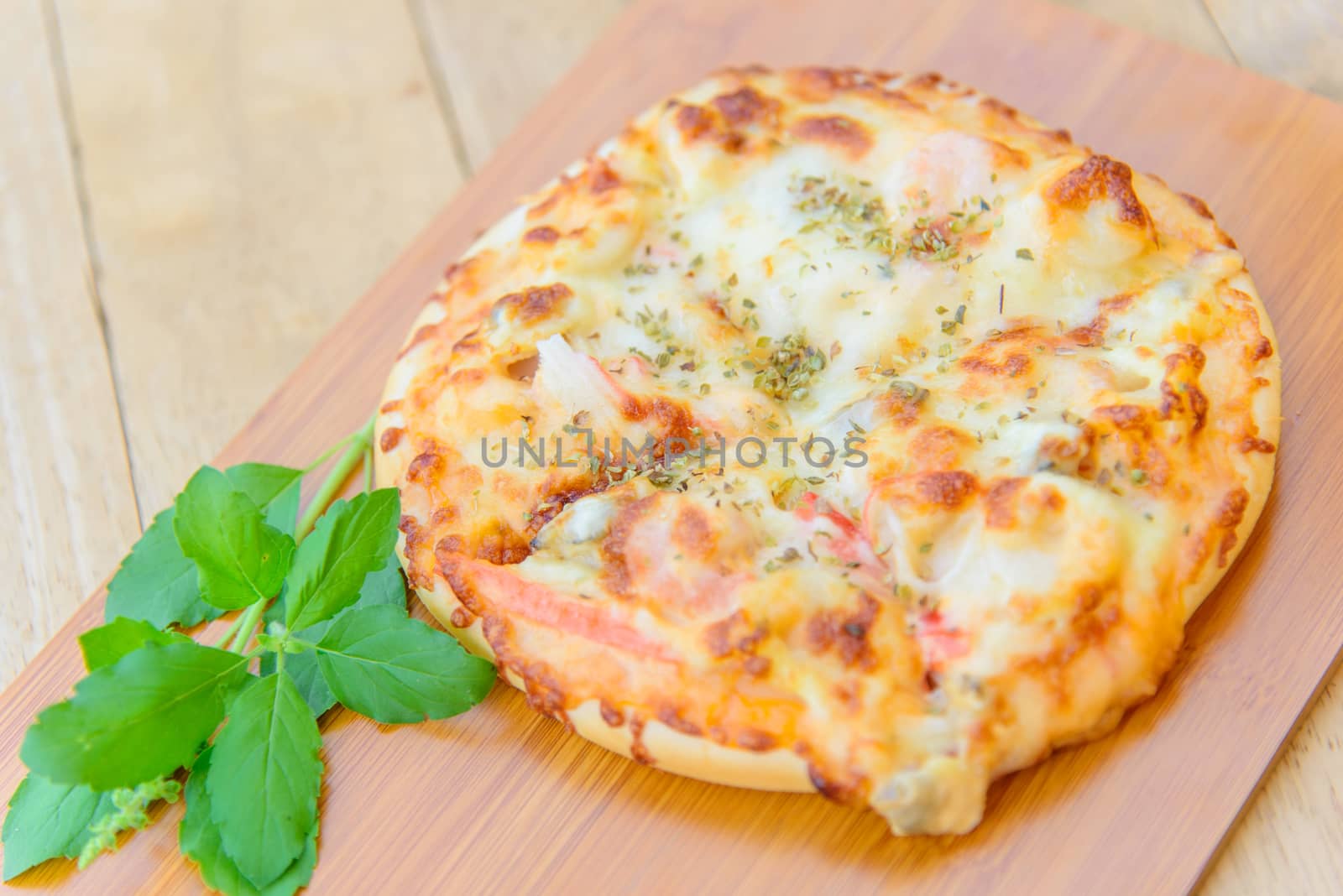 pizza Hawaiian Home made on wood plate by rukawajung