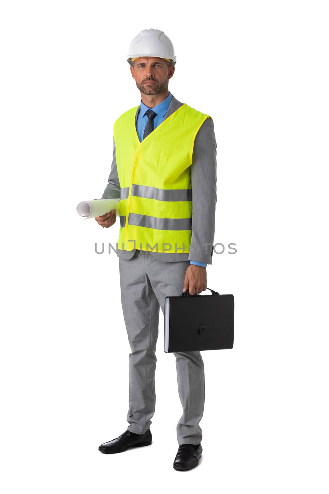 Male engeneer architect foreman in white hardhat and safety vest holding briefcase and blueprint isolated on white background, full length portrait