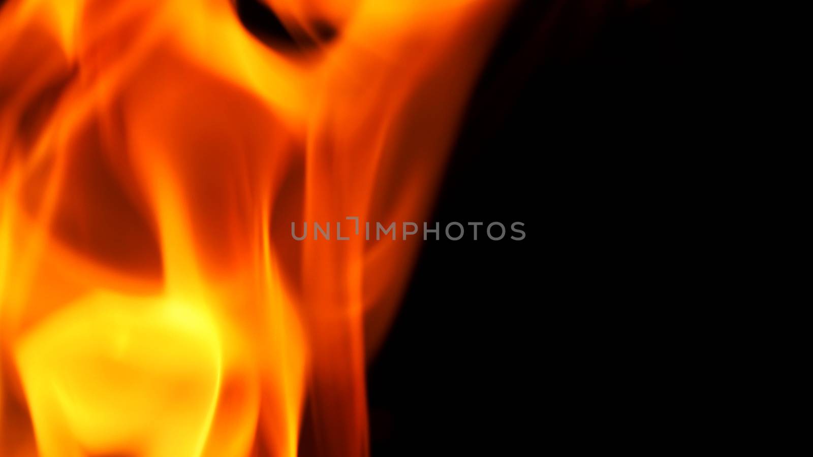 Abstract flame on black background by gnepphoto