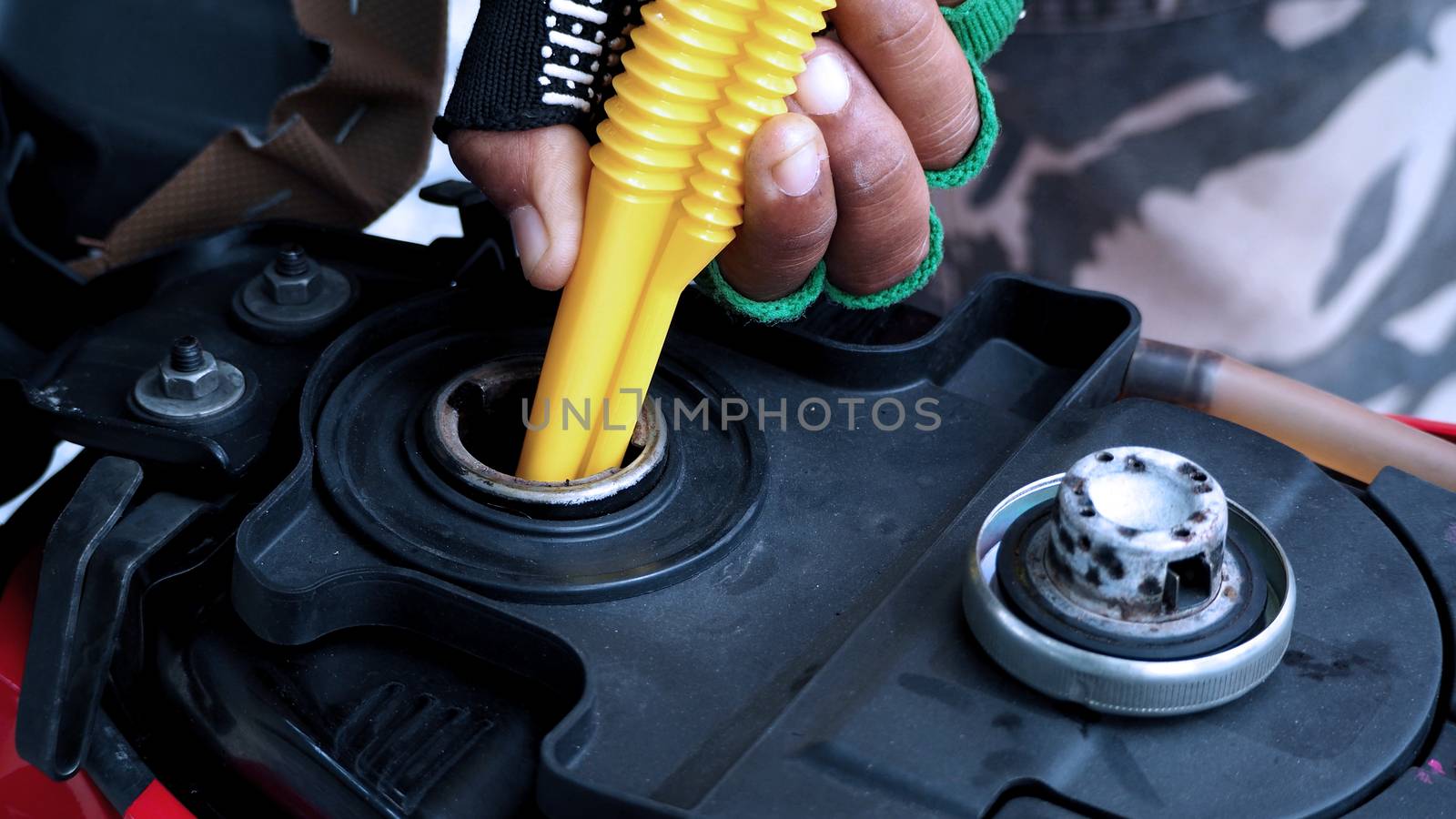 Fuel tank of motorcycle that opened and waiting for oil or gasoline and high angle view.