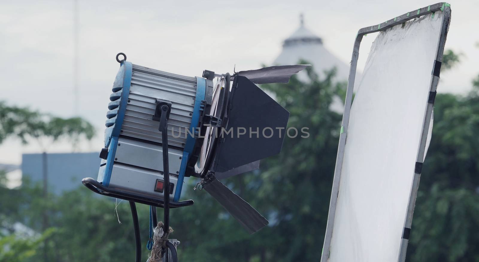 Big studio light and tripod for outdoor movie shooting. by gnepphoto