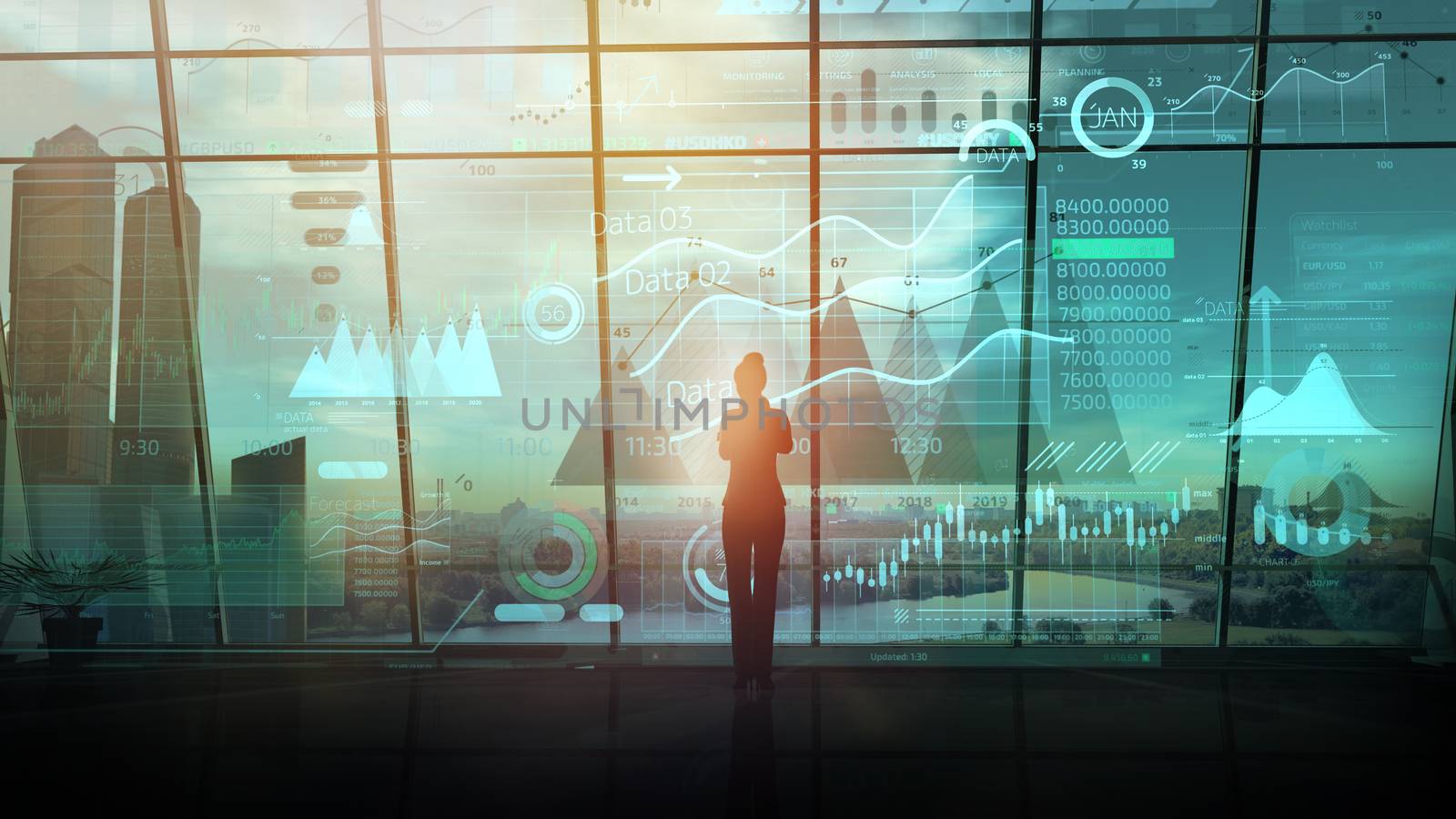 Silhouette of a business woman against an array of data in virtual reality on the background of an office window.