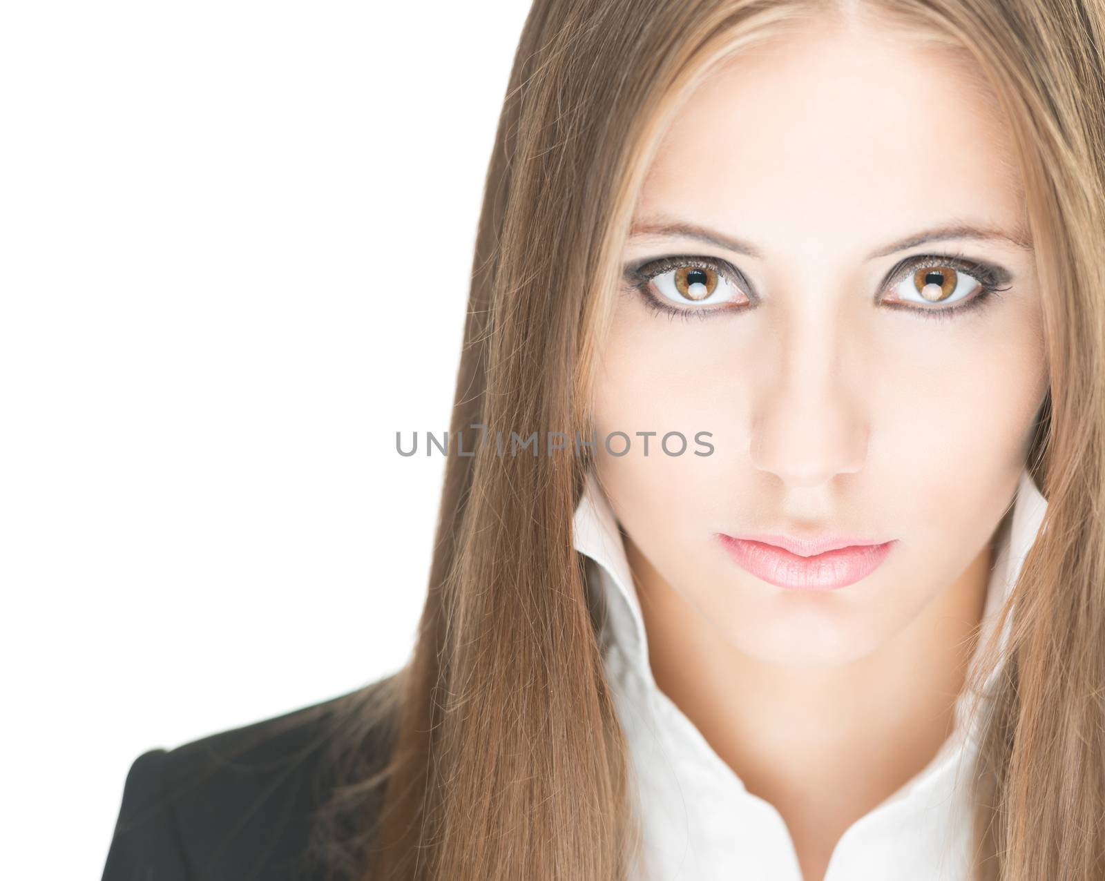 Portrait of stylish beautiful girl with long hair and bright make-up isolated on white background. Young business woman in black jacket and white blouse with raised collar looking serious and sexy.