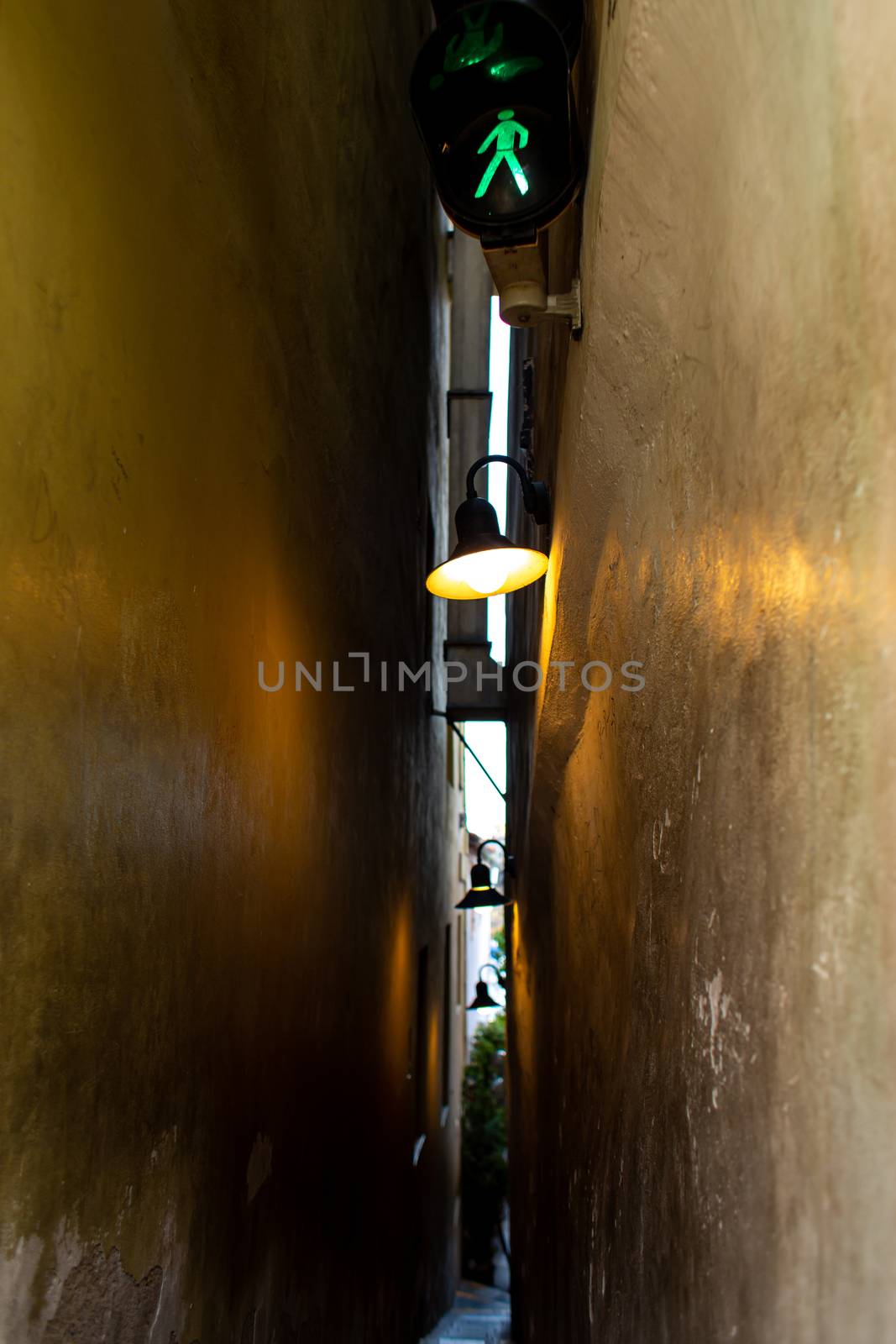 The architecture of the strago city of Prague. The narrowest street in Europe. The passage between buildings for one person, regulated by traffic lights by Try_my_best