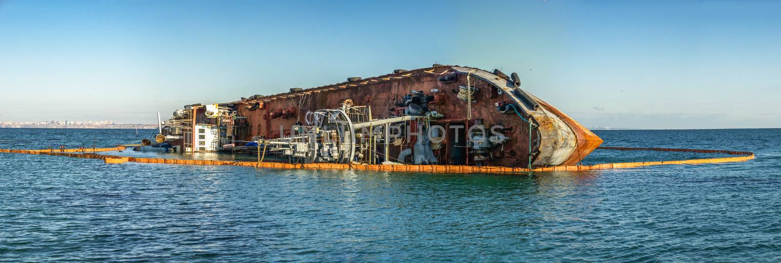 Odessa, Ukraine 12.04.2019. The wreck of a small tanker `DELFI` off the coast of Odessa on a sunny winter day