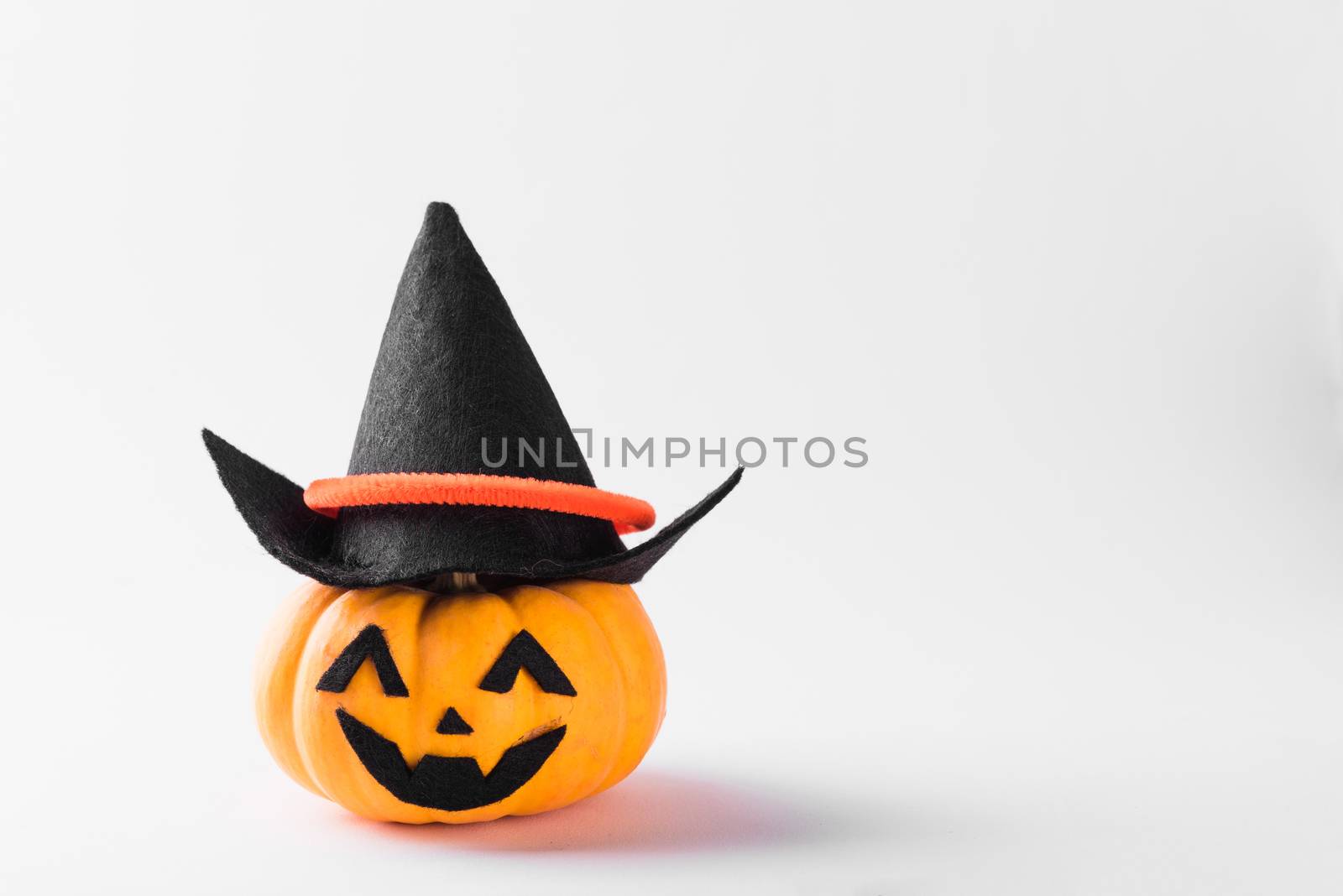 Funny Halloween day party concept ghost pumpkin head jack lantern scary smile wear hat, studio shot isolated on white background, Holiday decoration