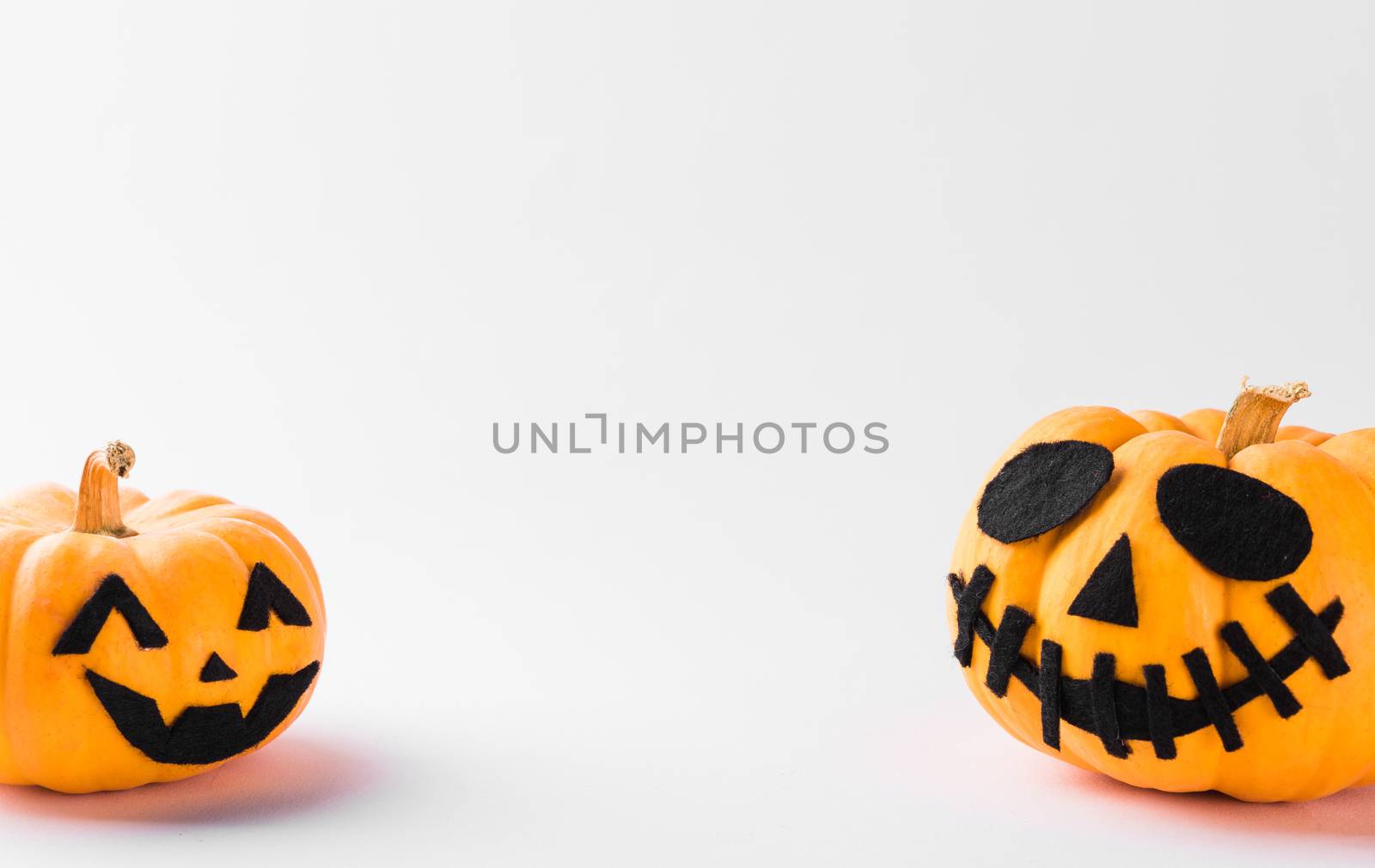 Funny Halloween day party concept ghost pumpkin head jack lantern scary smile, studio shot isolated on white background, Holiday decoration