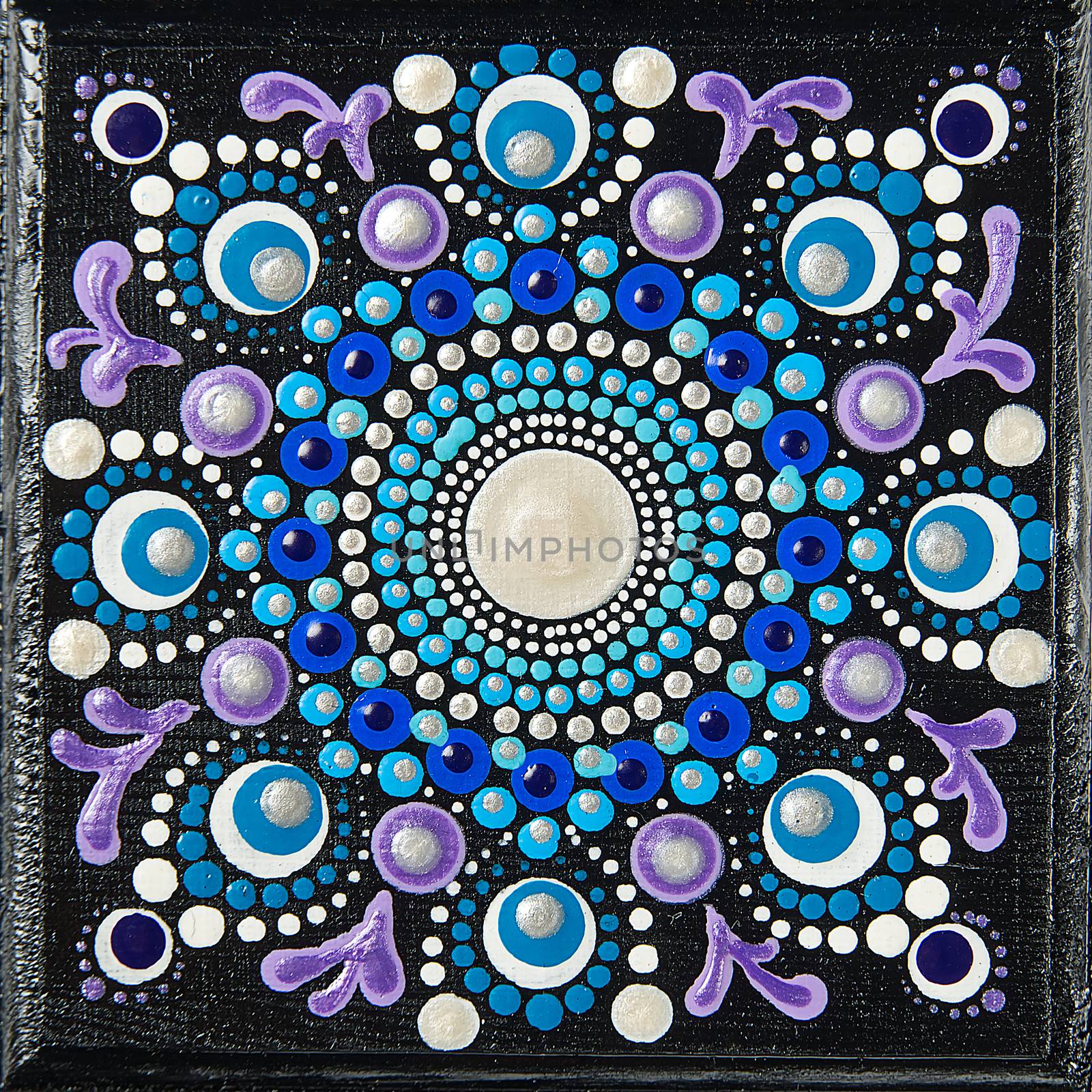 Mandala dot art painting on wood tiles. Beautiful mandala hand p by PhotoTime