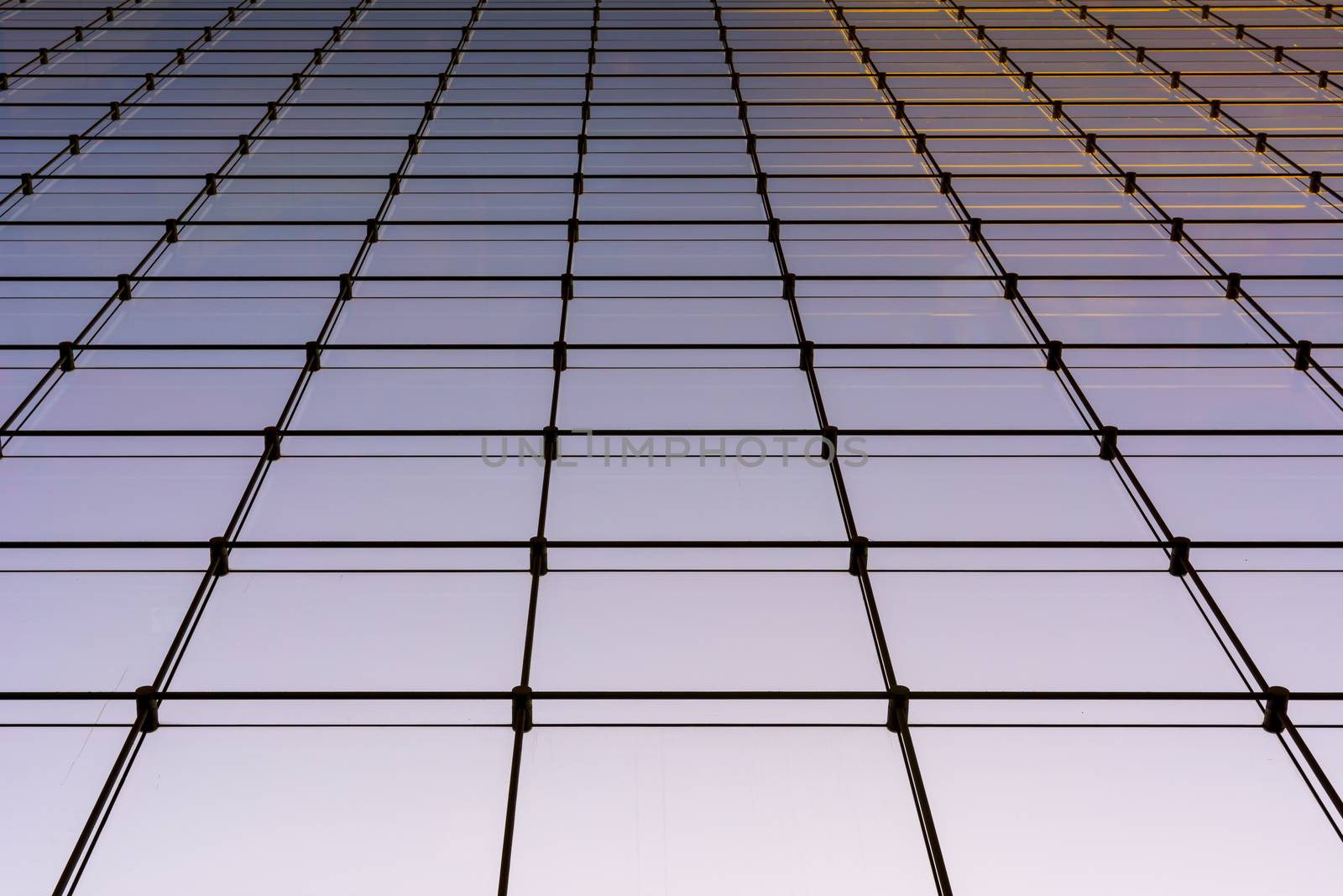 wall of glass, office building, windows framed with metal, vivid colors blue, magenta and orange by kb79
