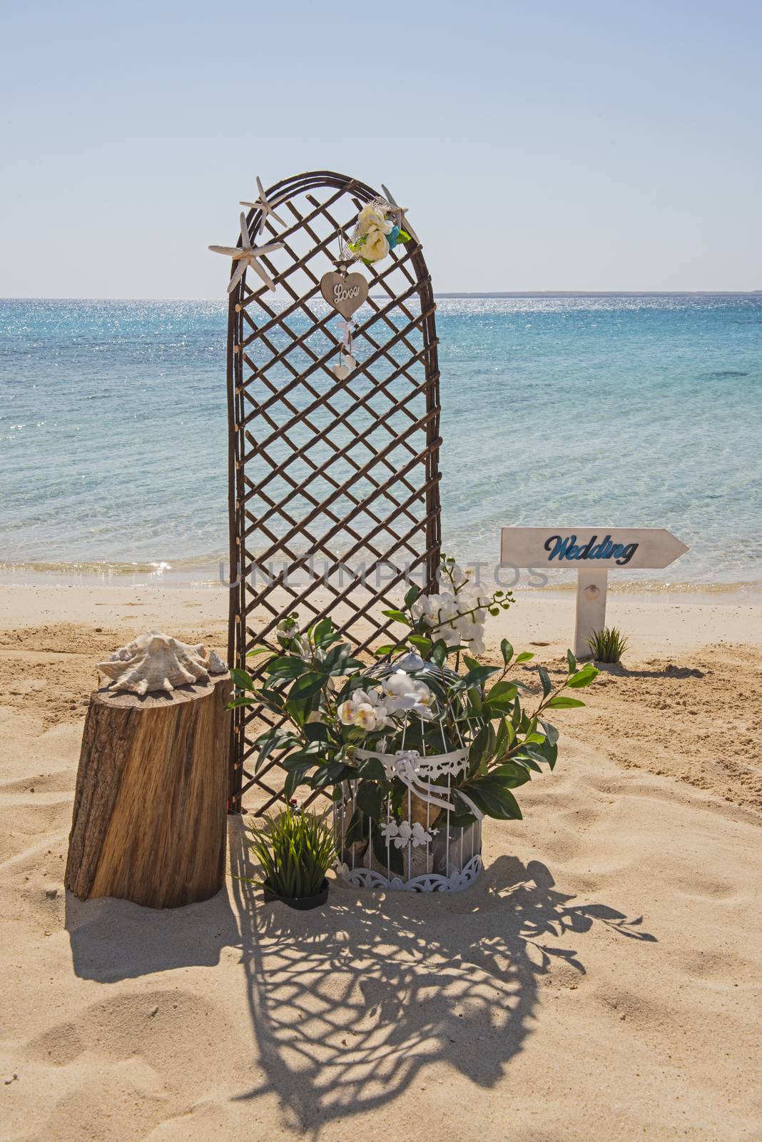 Wedding sign set up on a tropical beach paradise by paulvinten