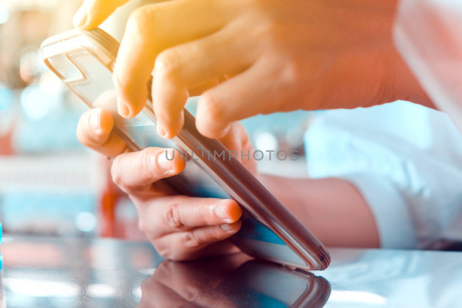 Closeup Image of Women Hand holding a smartphone