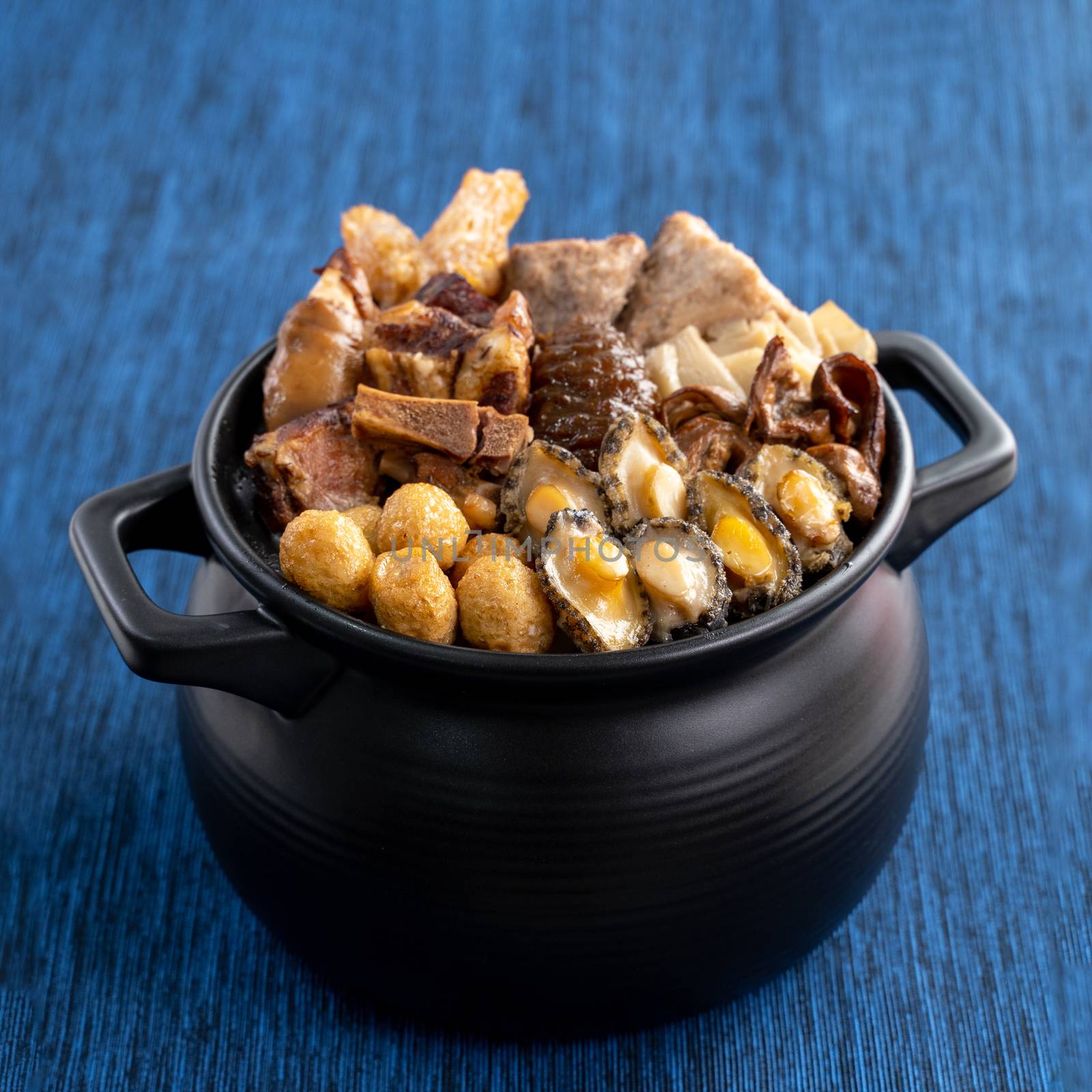 Traditional food of Chinese lunar new year, Buddha jumps over the wall, Chinese Soup Casserole dish, Buddha's Temptation, named Fo Tiao Qiang, close up.