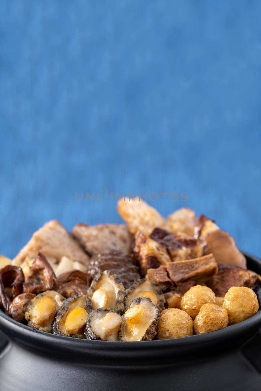 Traditional food of Chinese lunar new year, Buddha jumps over the wall, Chinese Soup Casserole dish, Buddha's Temptation, named Fo Tiao Qiang, close up.