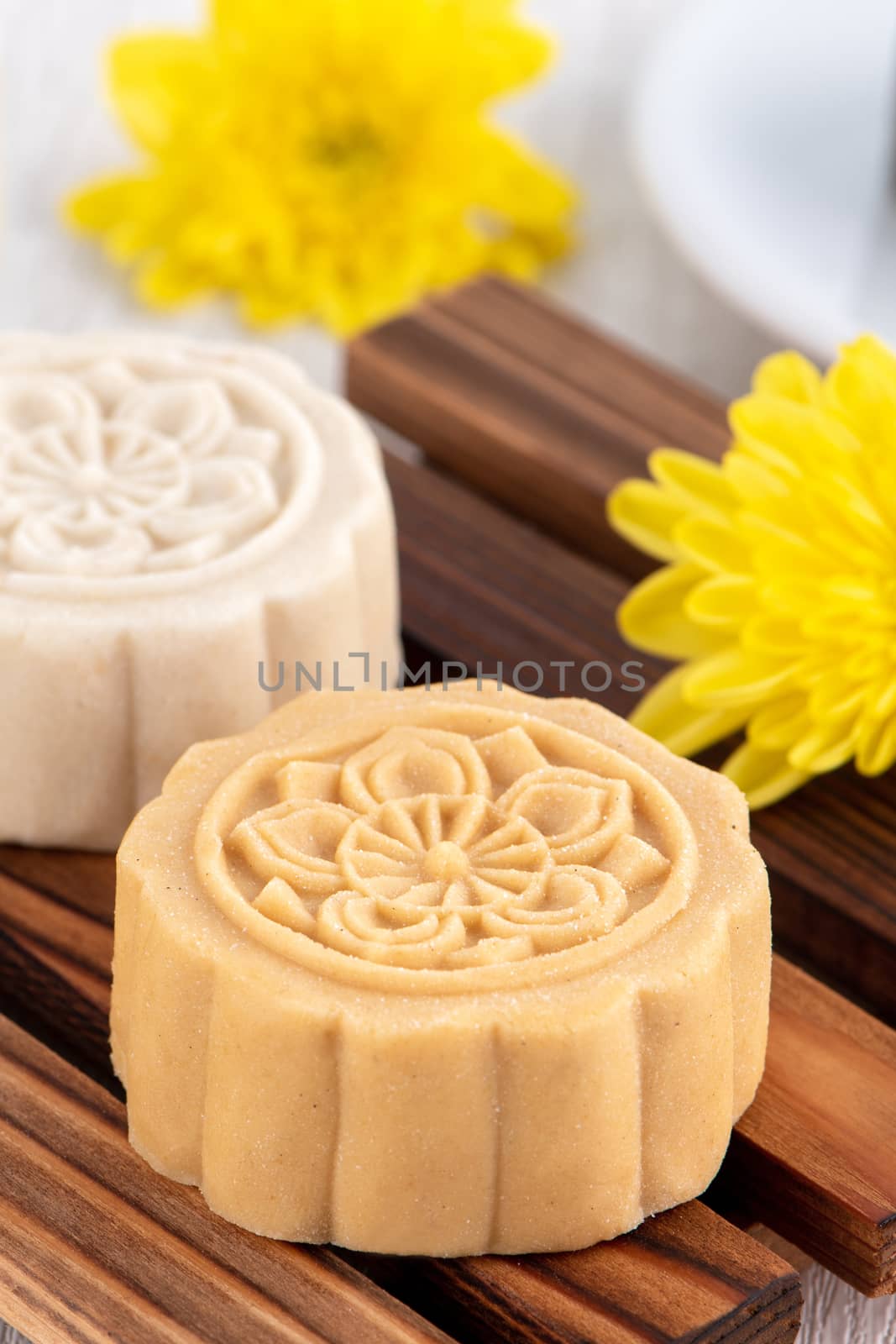 Colorful beautiful moon cake, mung bean cake, Champion Scholar Pastry cake for Mid-Autumn festival traditional gourmet dessert snack, close up.