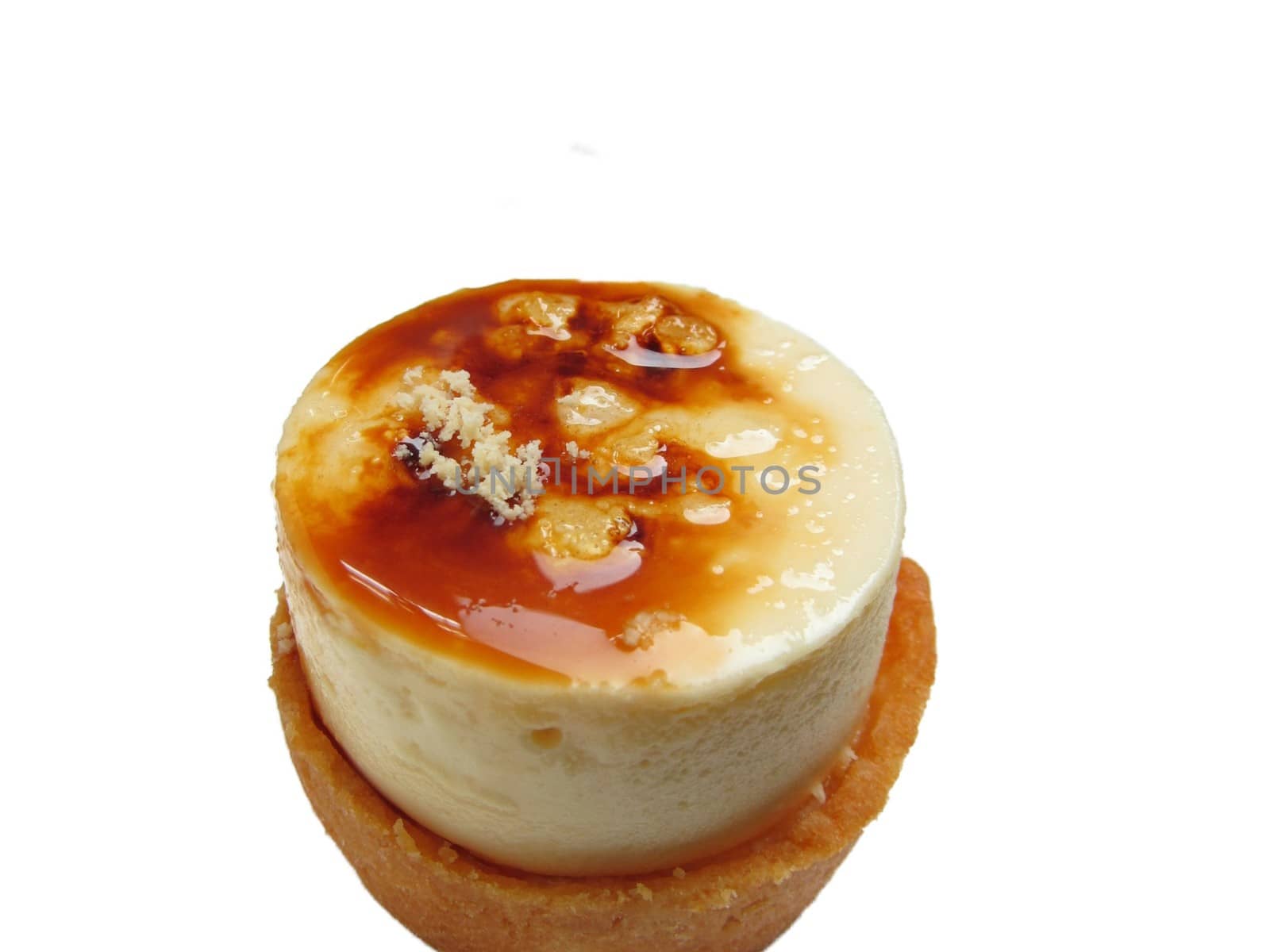 Closeup of a sweet flan dessert isolated on white background.