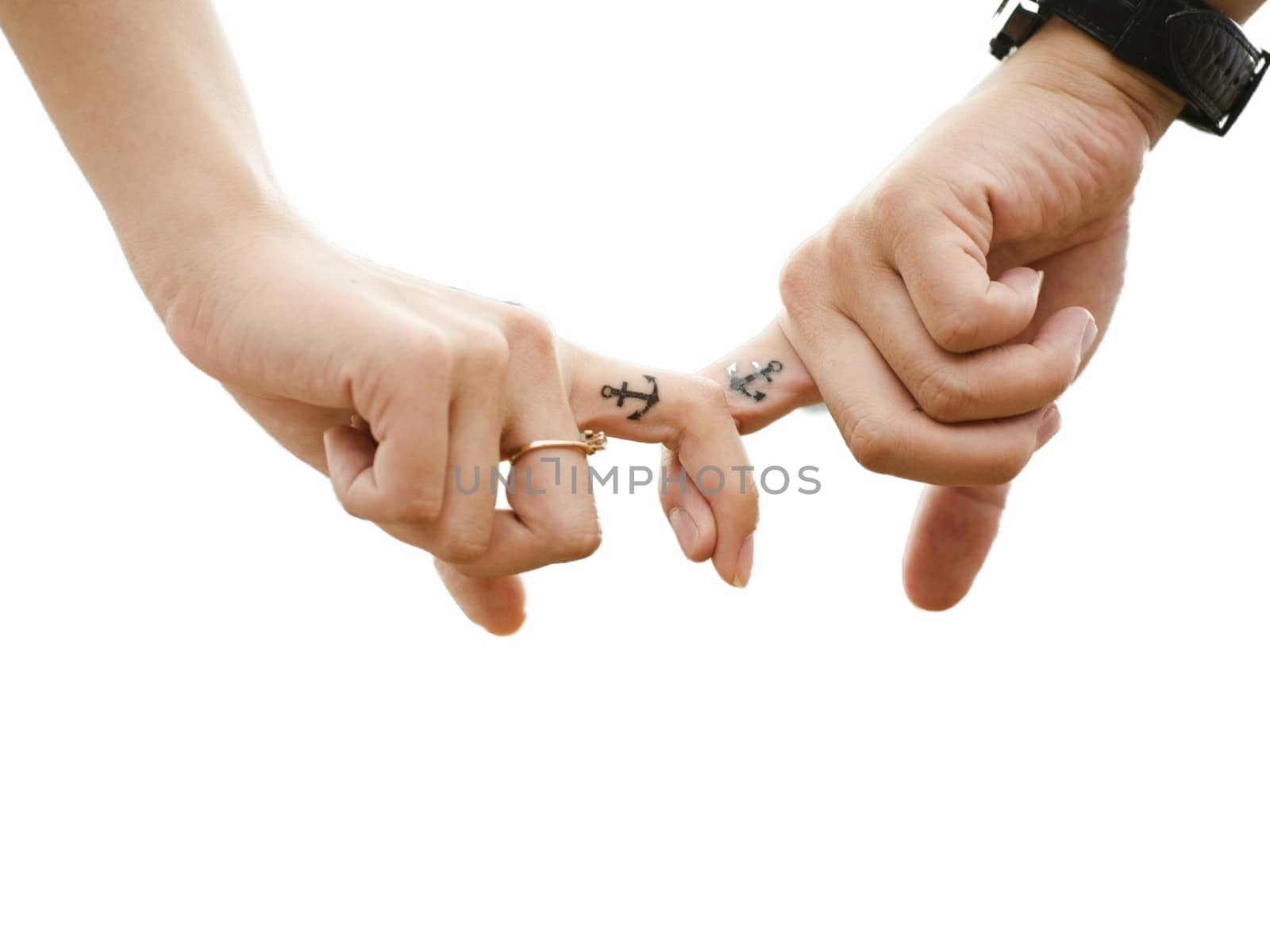 Couple in love hold each other's fingers as a symbol of their love by balage941