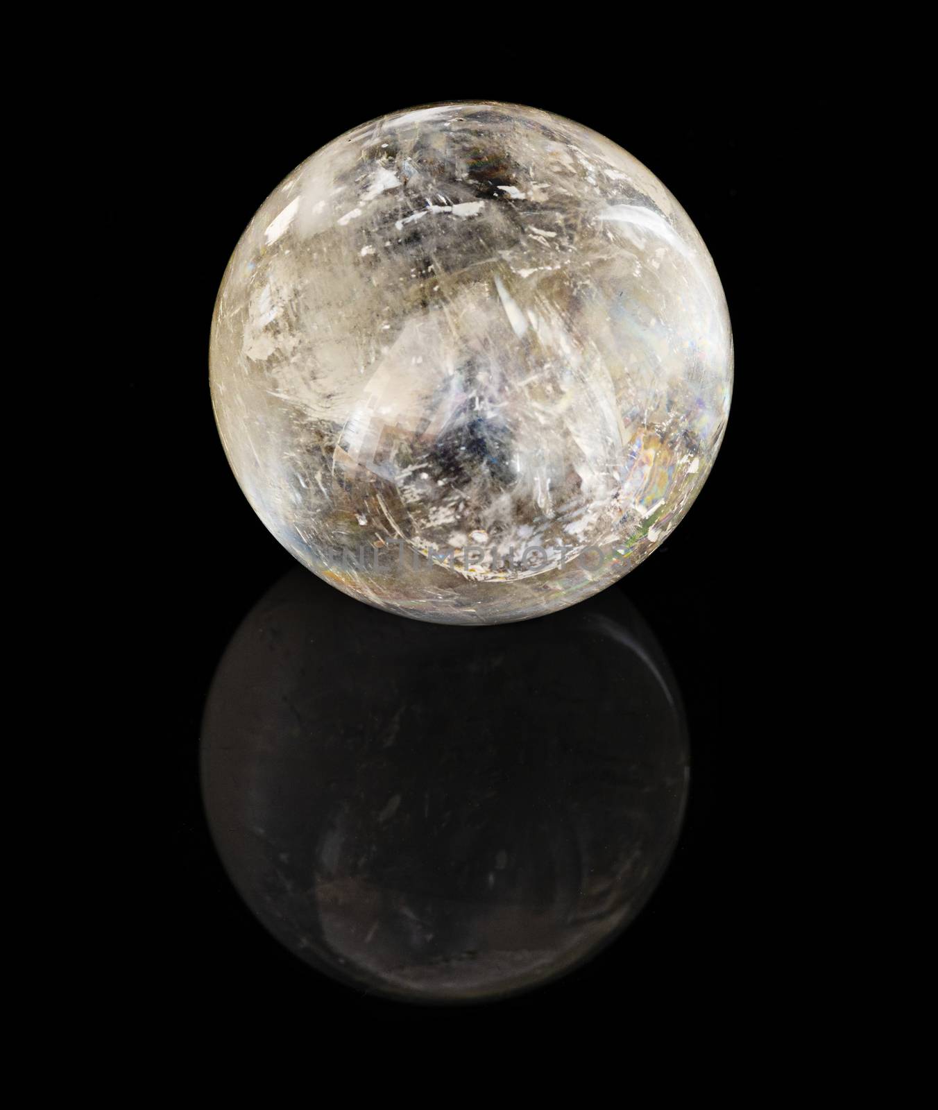 Crystal sphere on a black reflective background by fyletto