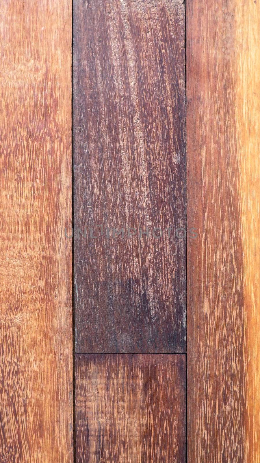 Old real natural wood texture surface of floor and dark brown color.