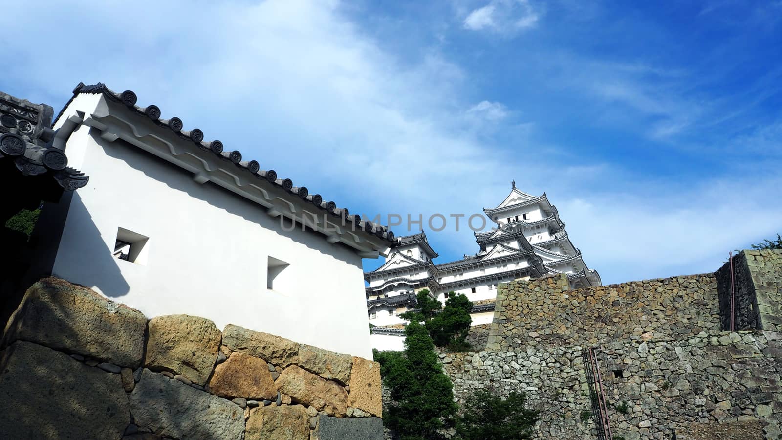 Himeji castle World heritage of Hyogo city in Japan and have a white color and blue sky background.