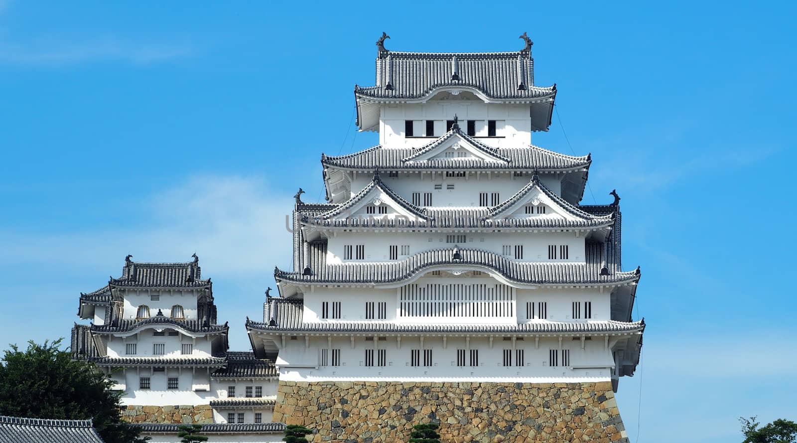 Himeji castle World heritage of Hyogo city in Japan and have a white color and blue sky background.