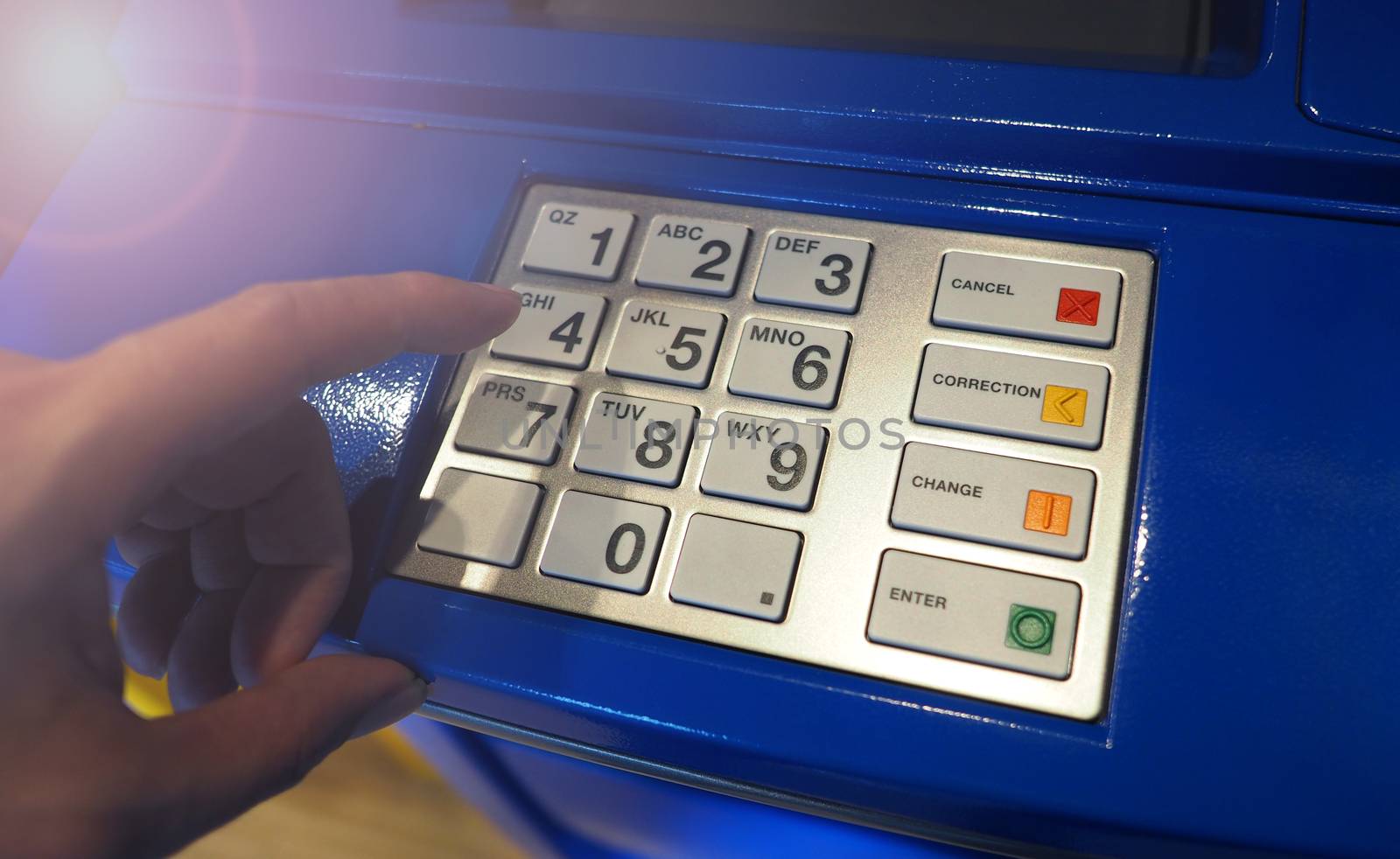 ATM machine close-up and number button and top view angle.