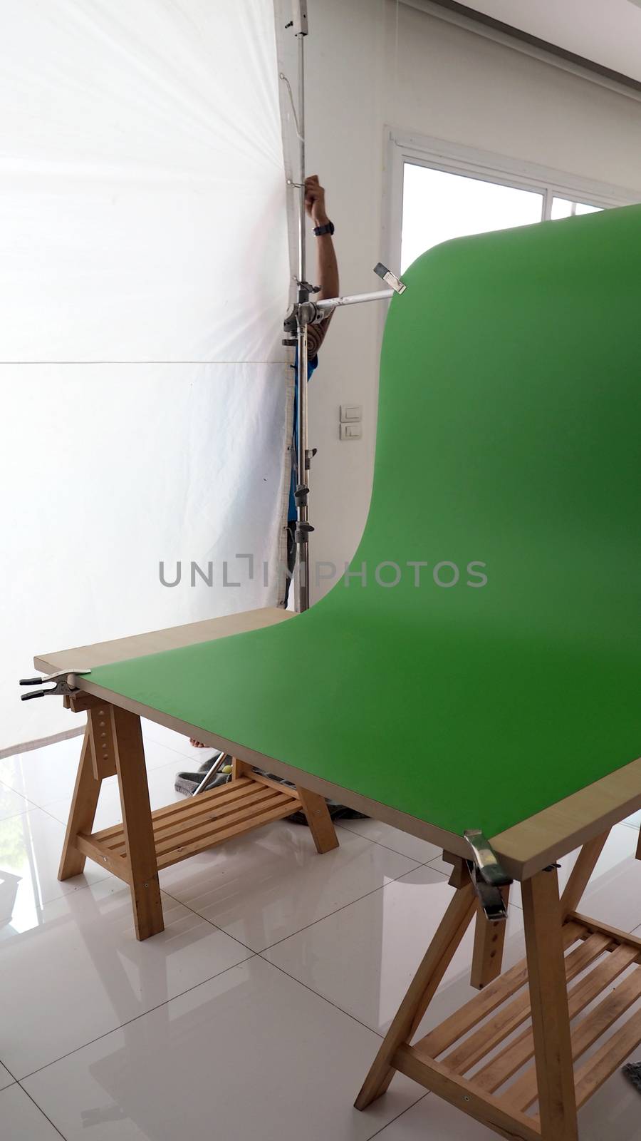 Small set of green screen background in studio. by gnepphoto