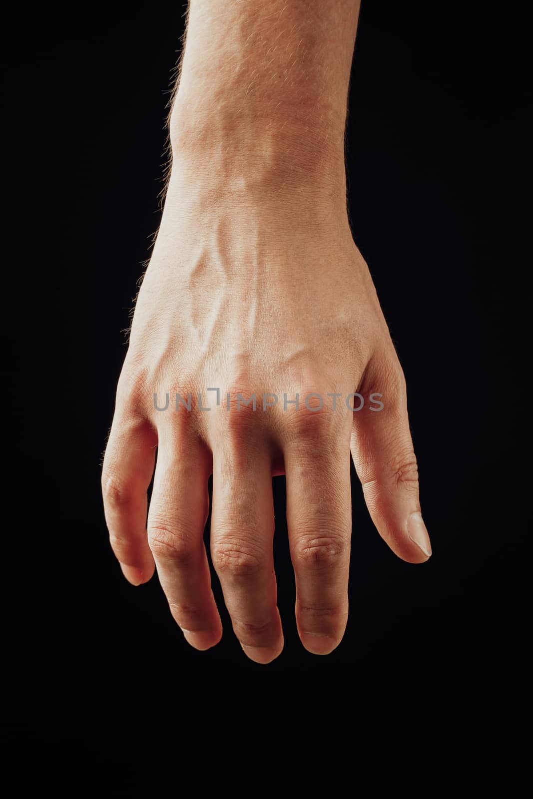 male hand, isolated on black by nikkytok