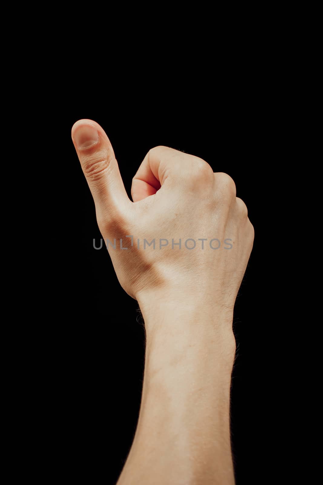 thumbs up male hand, isolated on black by nikkytok