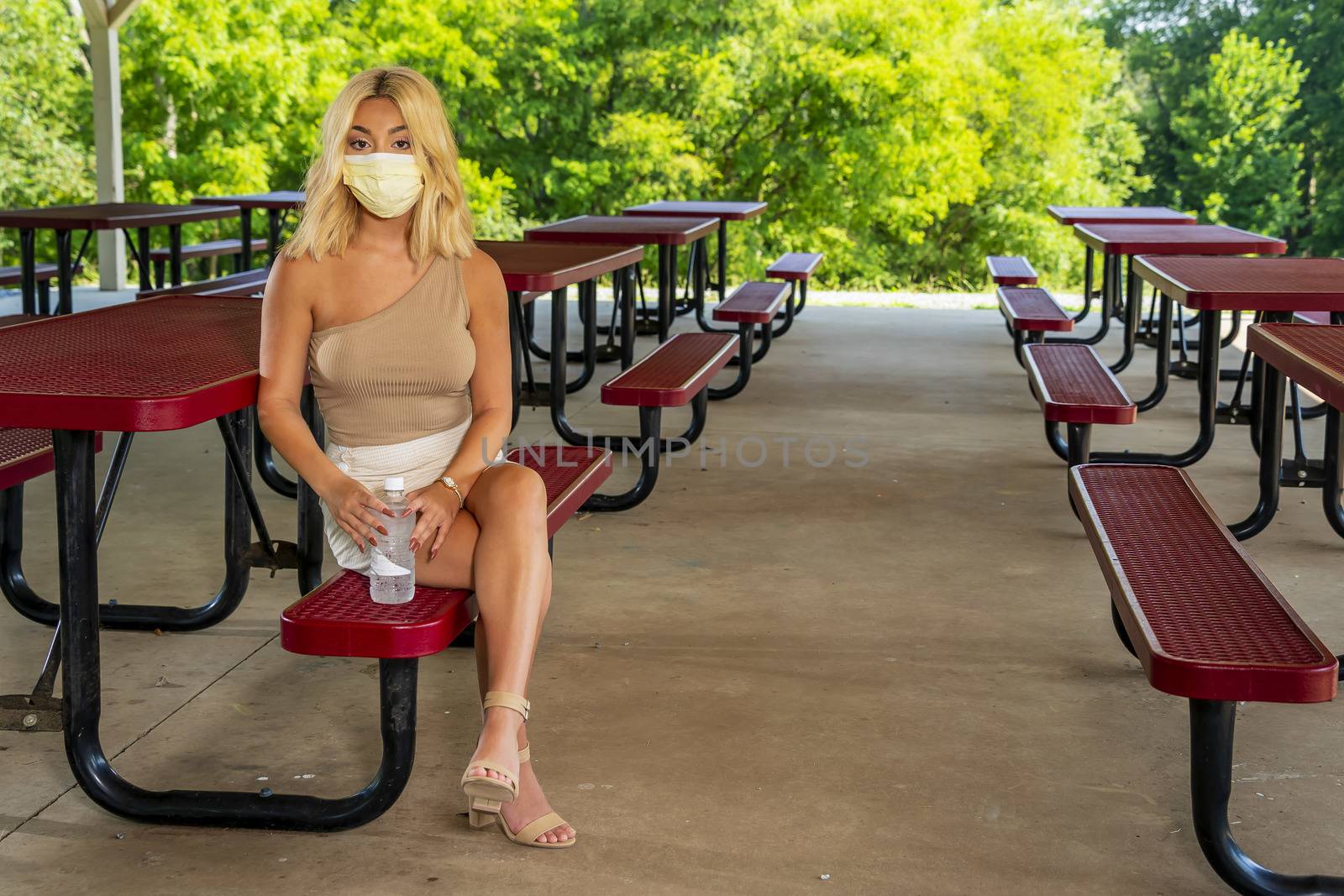 A gorgeous young blonde model enjoys a day outdoors while maintaining a safe distance from others during the Covid-19 pandemic