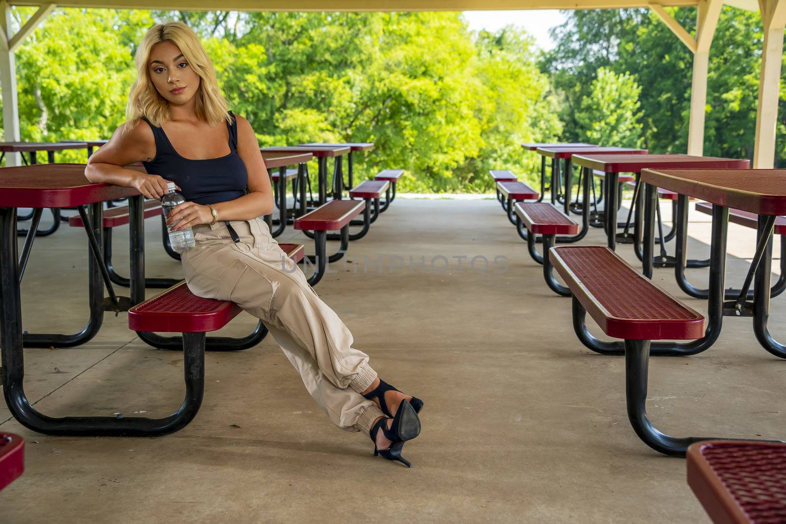 A gorgeous young blonde model enjoys a day outdoors while maintaining a safe distance from others during the Covid-19 pandemic