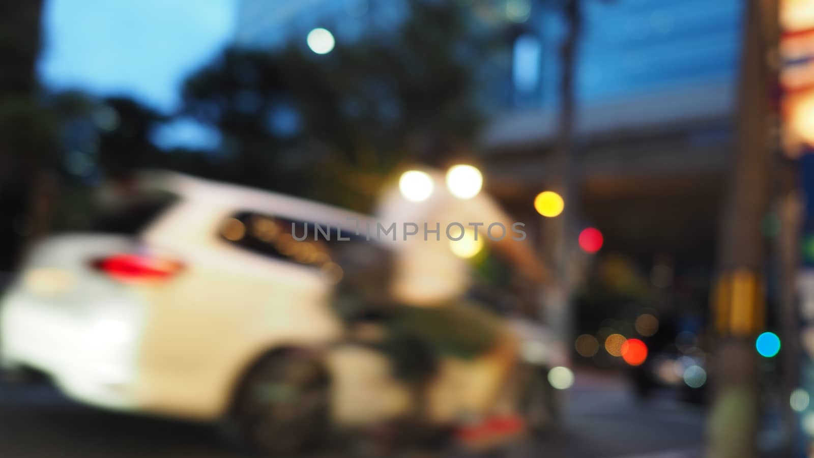 Blurry image of city street life. by gnepphoto