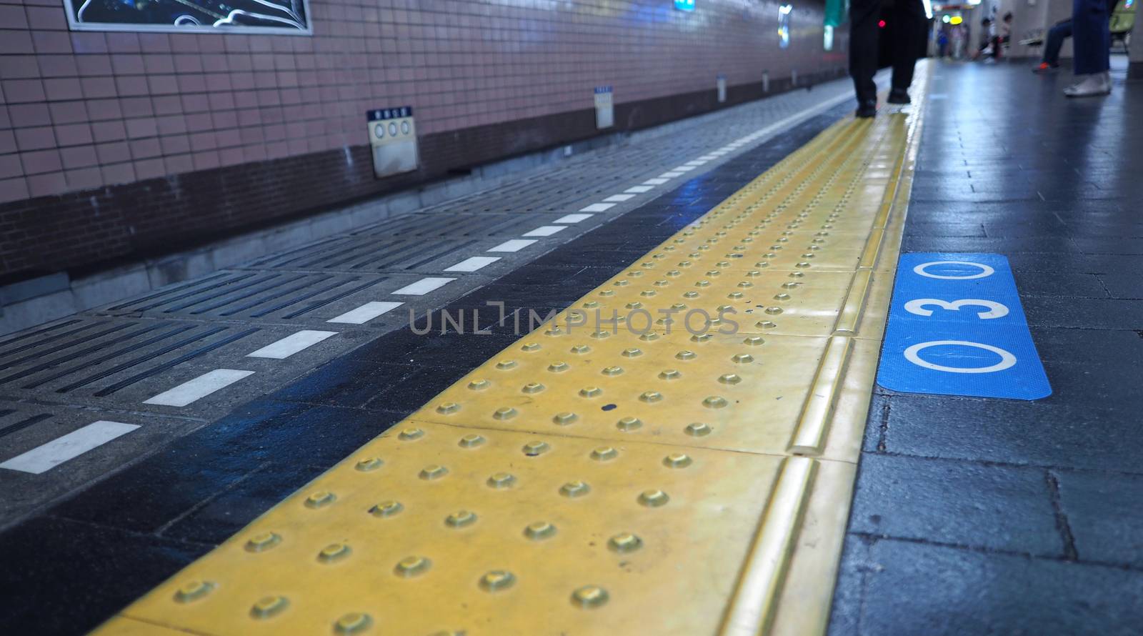 Old and dirty train platform or underground subway station in Osaka city Japan.