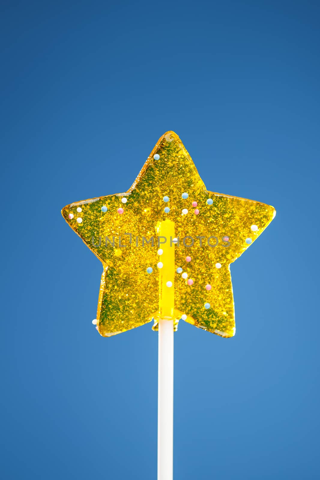 yellow star candy, blue background