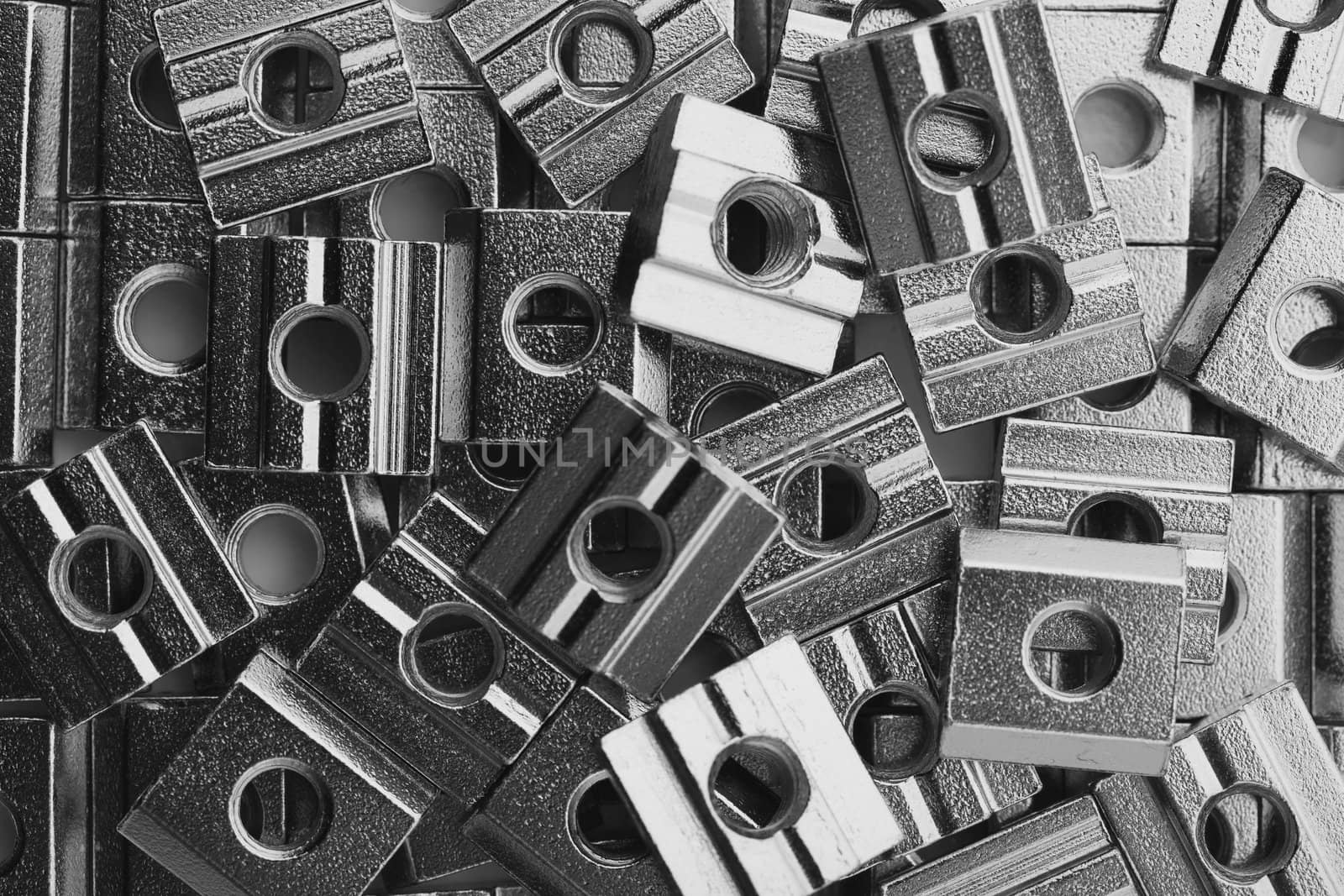 slide screw nuts heap, closeup view by nikkytok