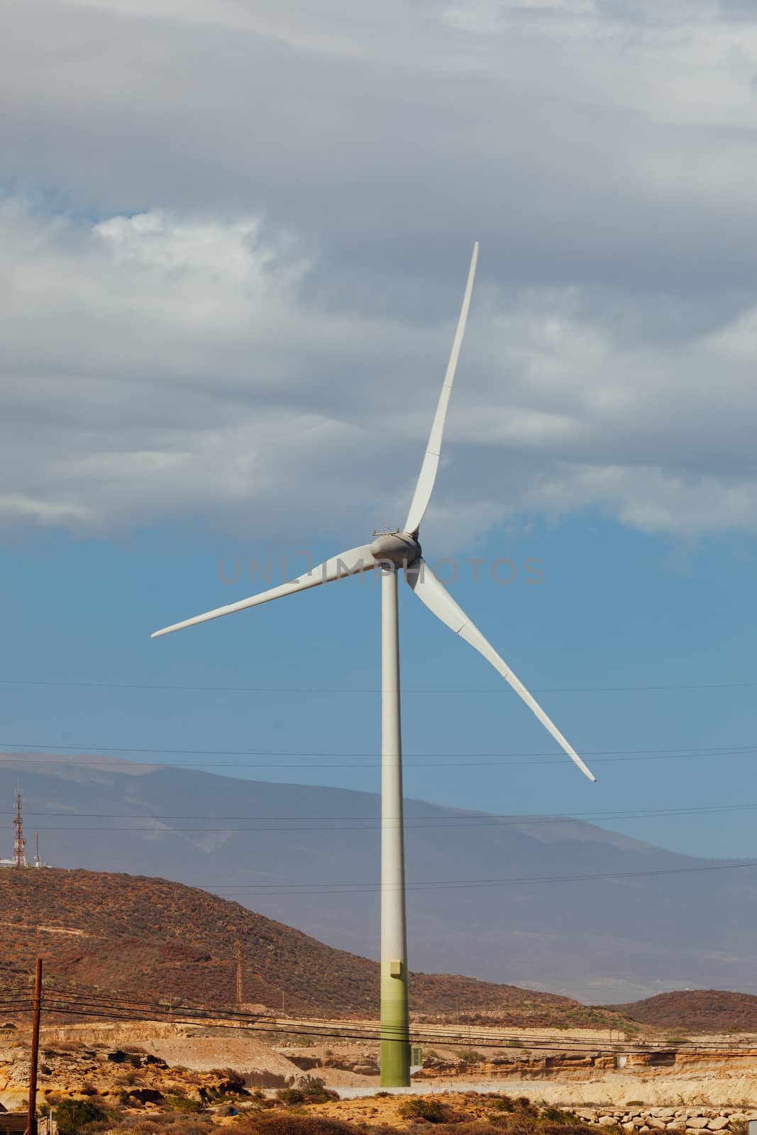 electric wind turbine farm, blue sky background by nikkytok
